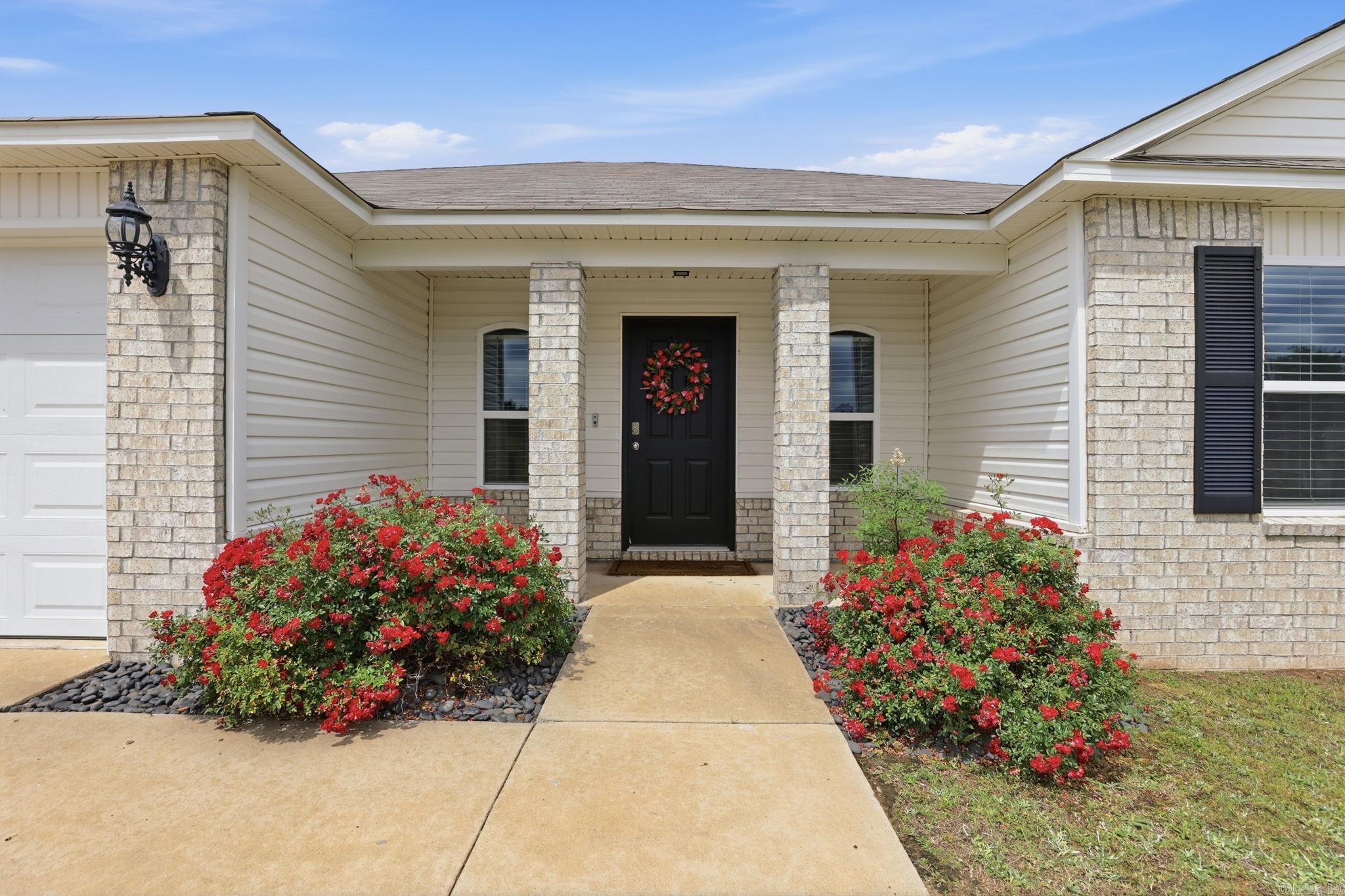 Welcome Home!! This well-maintained 4-bedroom, 2-bathroom home situated on a spacious corner lot is a must see. The open-concept layout easily accommodates everyday living, connecting the main living space to a functional kitchen complete with a breakfast bar, dining nook, and a roomy laundry area. Outside, the generous corner lot provides a two-car garage, a rear patio, and a large, versatile backyard. The neighborhood if located directly across from the local high school, and the home offers an incredibly convenient commute to the Air Force Base, Camp Robinson, local shopping, and major access roads. Credit towards fence provided by seller at closing!