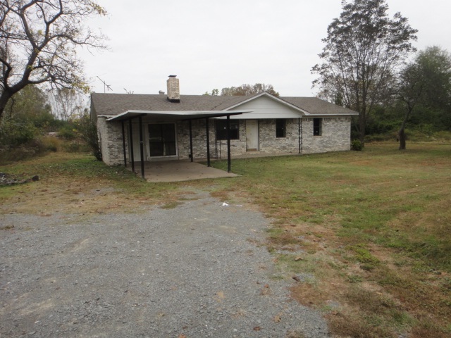 Great opportunity to own land and increase investment! This brick home has 4BR/2BA sits on 35.09 acres. Old barn is included. Large Master Bathroom. Added Den. Previous owner made it possible so new owner will have to buy all new appliances. SEE AGENT REMARKS.