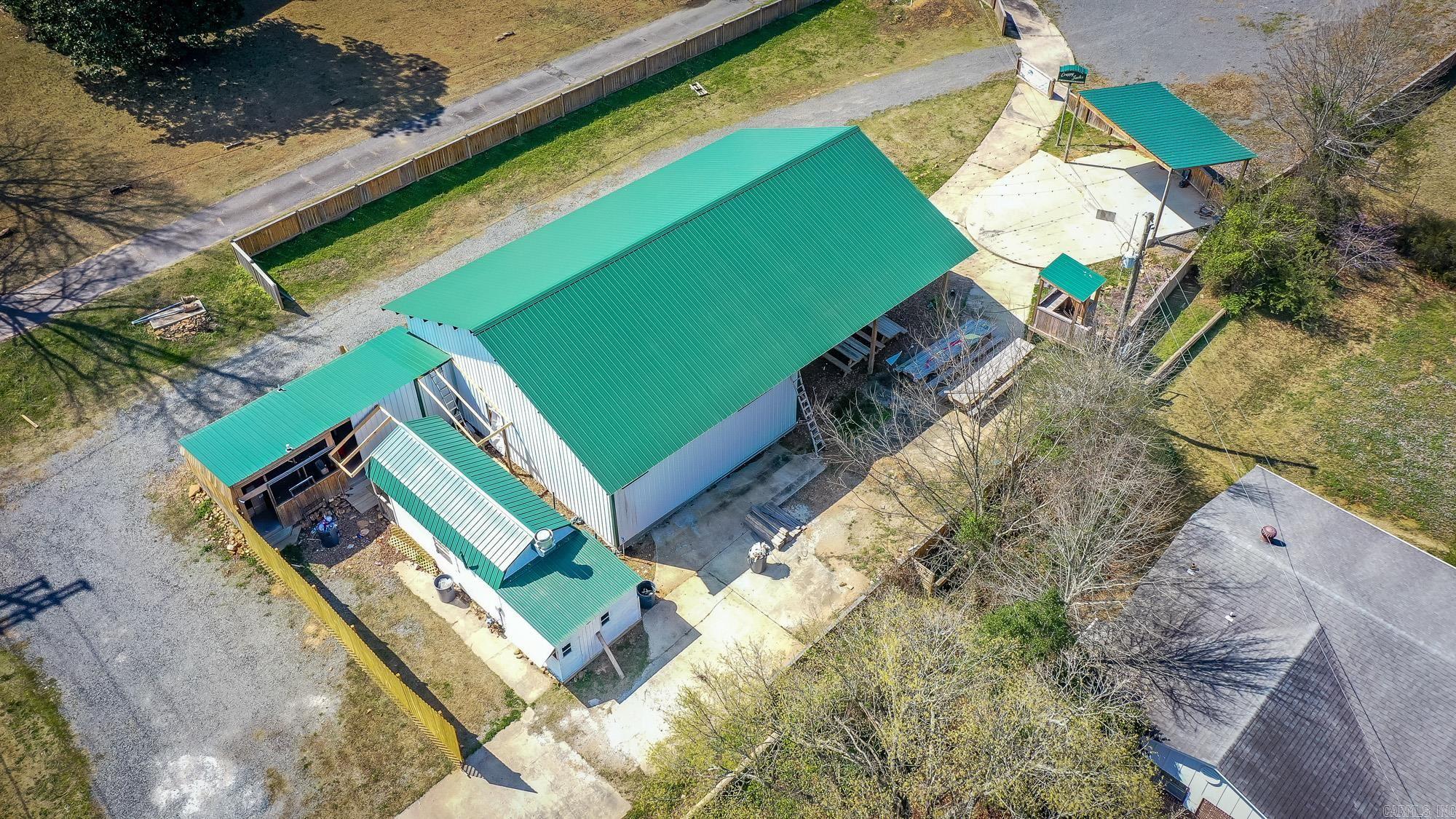 Here is your opportunity to own a well-known restaurant property in a high-visibility location with a unique, coastal-style setting. Formerly operated as a popular seafood restaurant, the property has since been purchased with plans to convert it into an Italian restaurant, with some renovations already underway. The outdoor dining area has been enclosed, though construction is not fully complete, allowing the next owner to finish it to their vision. The property offers multiple structures and a spacious layout that previously accommodated large gatherings and entertainment. This is primarily a real estate offering with buildings in place and strong potential for redevelopment, restaurant use, or a new concept. Property may also be leased for $4,000 per month.  See agent remarks for additional details.