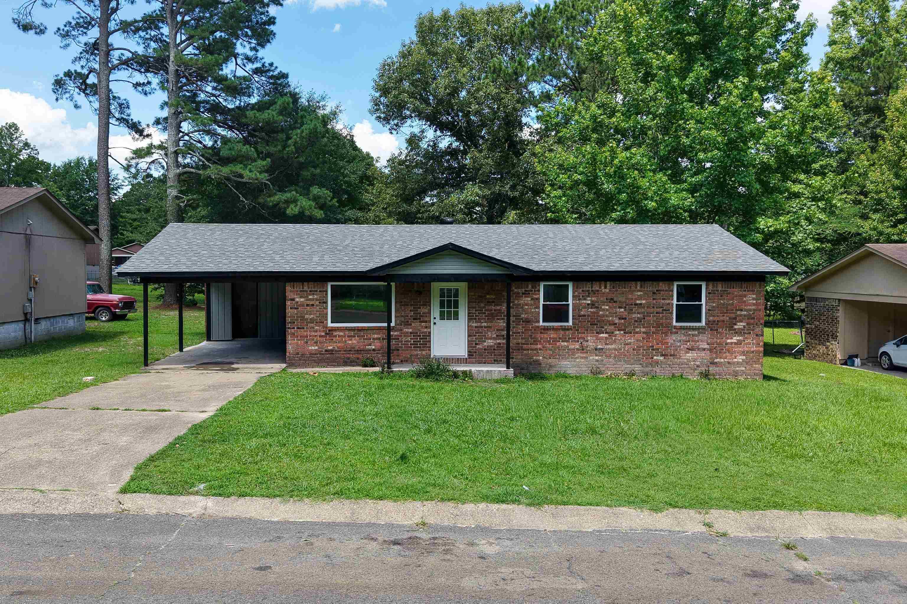 Welcome home to this beautifully remodeled brick home featuring 3 bedrooms, 1.5 baths, and approximately 1,161 +/- square feet of living space. Thoughtfully updated from top to bottom, this home offers a new roof, new HVAC system, updated plumbing, and a new water heater for added peace of mind. The kitchen has been refreshed with all-new appliances, including a range, dishwasher, and microwave, creating a functional and inviting space for everyday living. With modern updates throughout and move-in ready condition, this is a property you'll want to see in person
