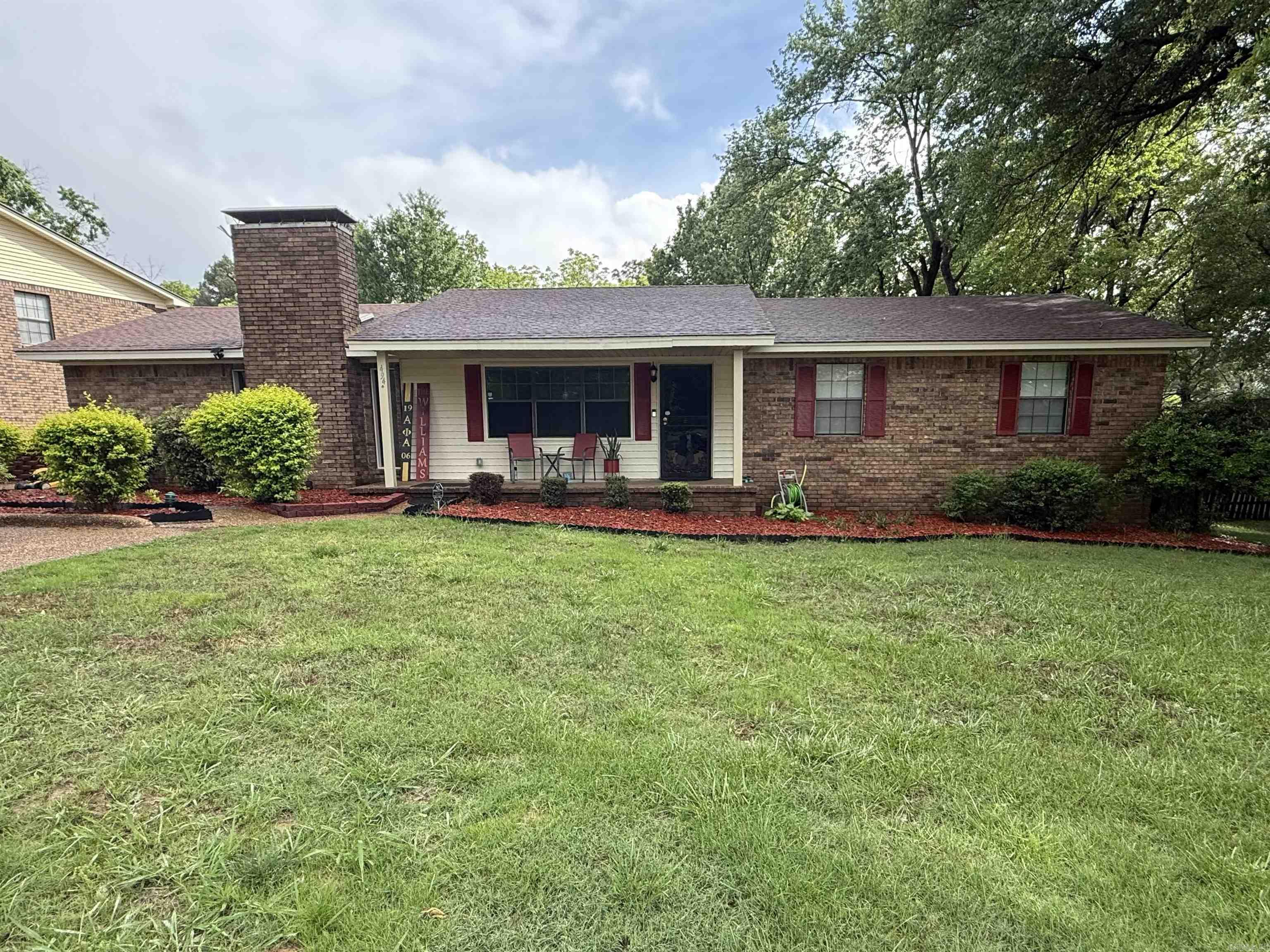Charming 3-Bedroom Home in an Established Neighborhood!  This spacious home offers approximately 1,809 square feet of comfortable living space with 3 bedrooms and 2.5 bathrooms. Situated in a well-established neighborhood, the property features a wonderful outdoor living area complete with a screened porch, patio, storage building, and a fenced backyard—perfect for relaxing or entertaining.  Inside, you’ll find several updates throughout the home. The kitchen and dining area combination includes a convenient butler’s pantry with a prep sink, along with an electric stove, dishwasher, and refrigerator. The inviting den features fresh paint, a cozy wood-burning fireplace, a wet bar, and plenty of space for family gatherings.  With its functional layout, desirable amenities, and great outdoor space, this home is ready for its next owner to enjoy. Schedule your showing today!