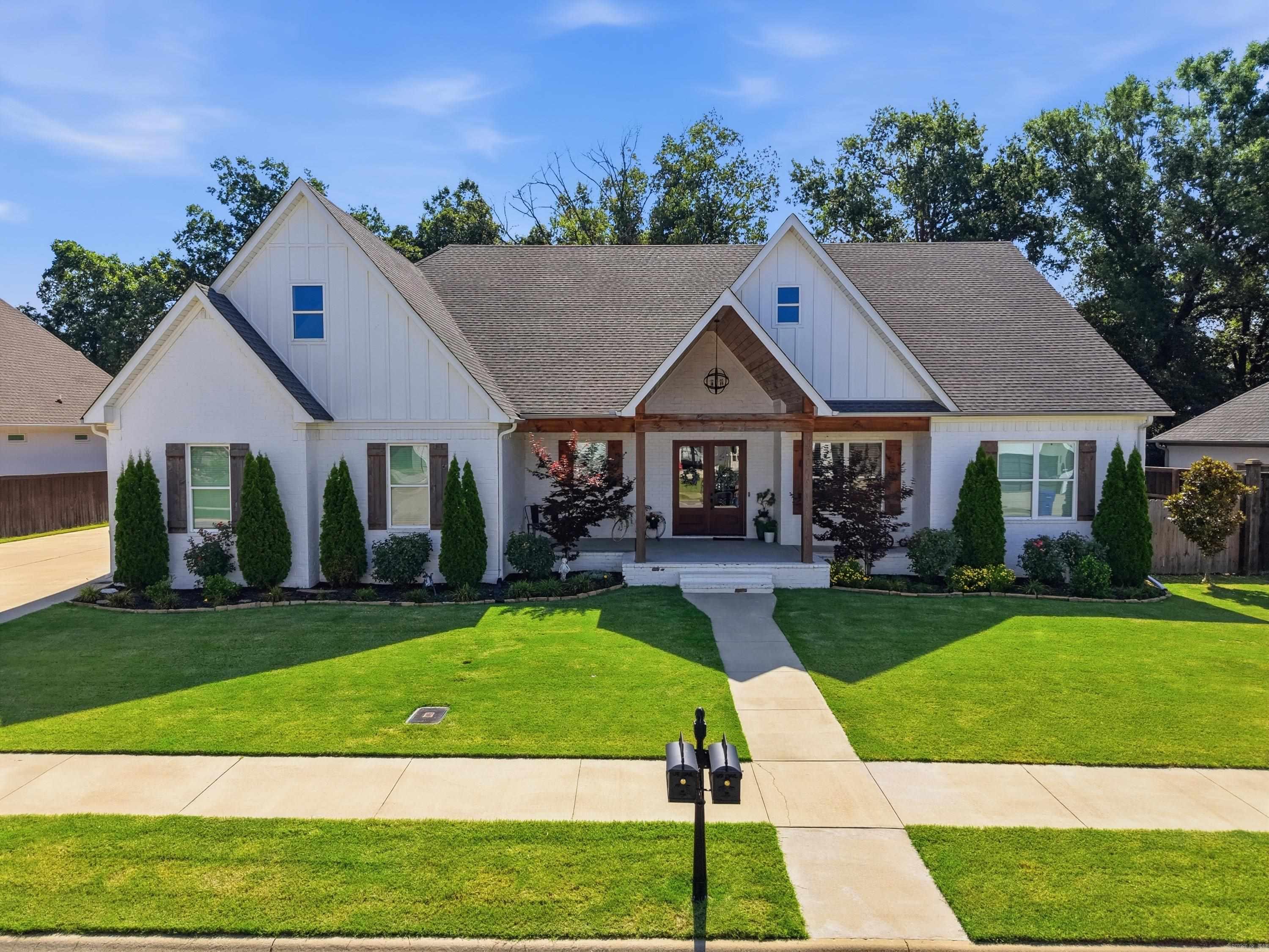 Welcome to this exceptional custom built luxury home in Winterbrook, one of Conway's most sought-after neighborhoods.  Designed with impeccable craftsmanship and thoughtful details throughout.  This stunning home offers elegance, comfort, and modern convenience.  Boasting 4 spacious bedrooms, 3 full bathrooms, 1 half bath, and a bonus room. The heart of the home showcases a custom-built design with high-end finishes, beautiful architectural details, and an open, inviting layout. Each bedroom offers walk-in closets complete with custom built-ins.  The primary suite features a claw foot tub, heated bathroom floors for year-round comfort, and so much more.  Step outside to the oversized front or back porches that are perfect for entertaining. Schedule your showing today!