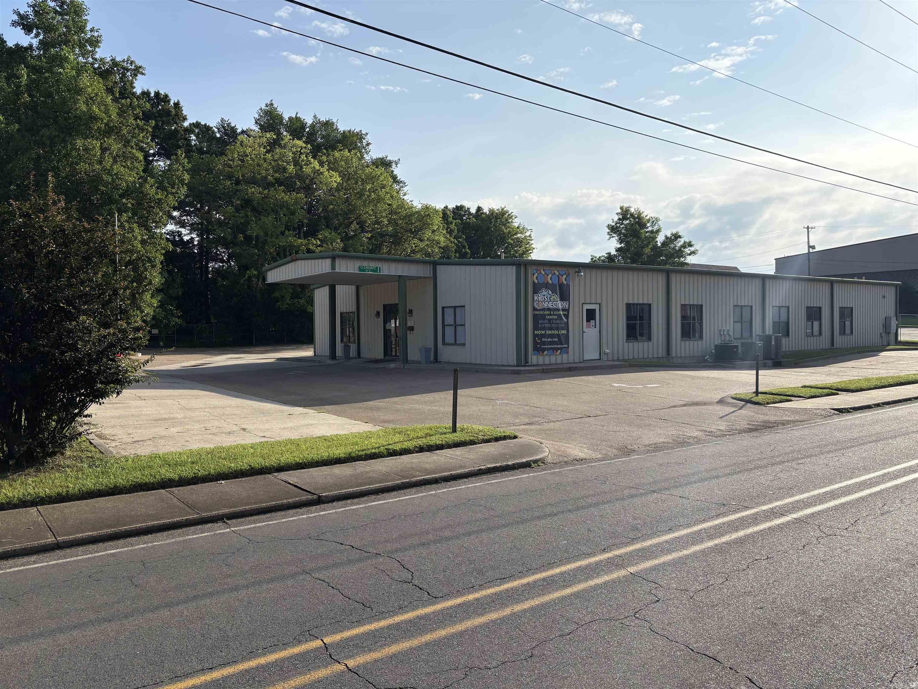 If you are looking for your next business adventure; THIS IS IT! TURNKEY- ready to go on day one! Endless possibilities await you with this 5400 sq ft commercial property. Bring your vision and dream to life with flexibility and room to grow a wide range of businesses. Versatile space ideal for commercial, educational, business development, and investment opportunities. CURRENTLY A THRIVING CHILD CARE CENTER offering a variety of age based classrooms, commercial style kitchen, restrooms, office, laundry, and playground areas- plus tons of storage. Updates include newer HVAC units and water heater. You'll appreciate the easy access, ample on-site parking and strong visibility with this location. Additional rental income opportunity with property next door (1224 Walnut Street). Call Today!