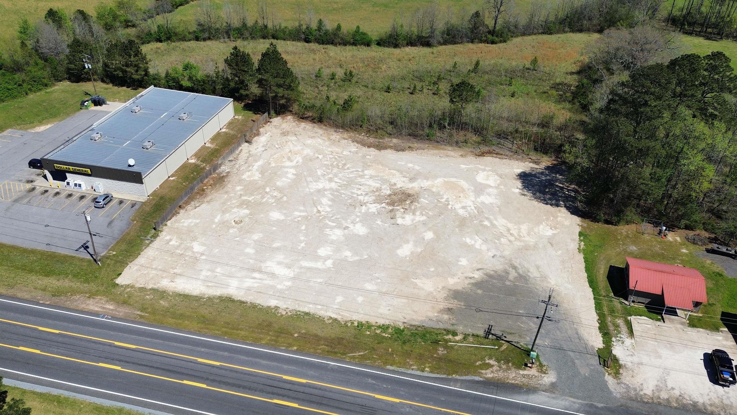 Incredible opportunity to own 1.25 cleared and level acres on Highway 67, directly across from the Glen Rose School. This high-visibility location is ideal for commercial development or investment. Utilities are already on site, making it ready for your next project. With easy access and strong daily traffic, this is a strategic spot for a business or long term investment.