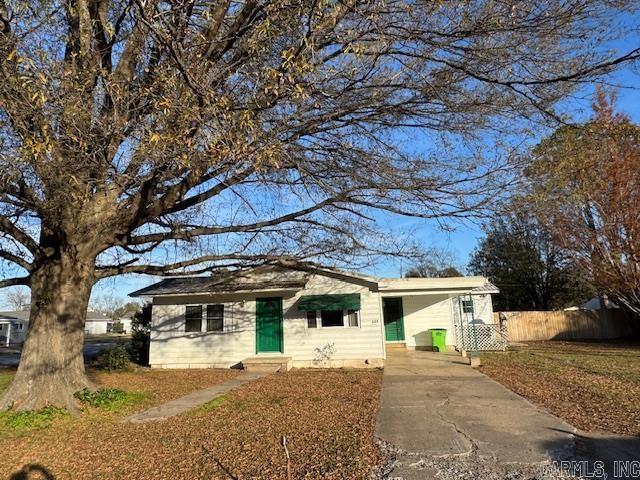 Price Reduced. Nice 3 bedroom, 2 bath home with 1898 sq. ft. The home has a metal roof on a spacious, tree-shaded corner lot with a privacy fence. This property features a dine-in kitchen, with a large main living area, and an additional great room. A glass-enclosed back porch is a nice place to relax. An extra-large 1593 sq. ft. detached garage/storage building, at the back of the lot, offers ample space for hobbies, workshops, or extra storage. With plenty of potential, this is an opportunity to make this home your own.