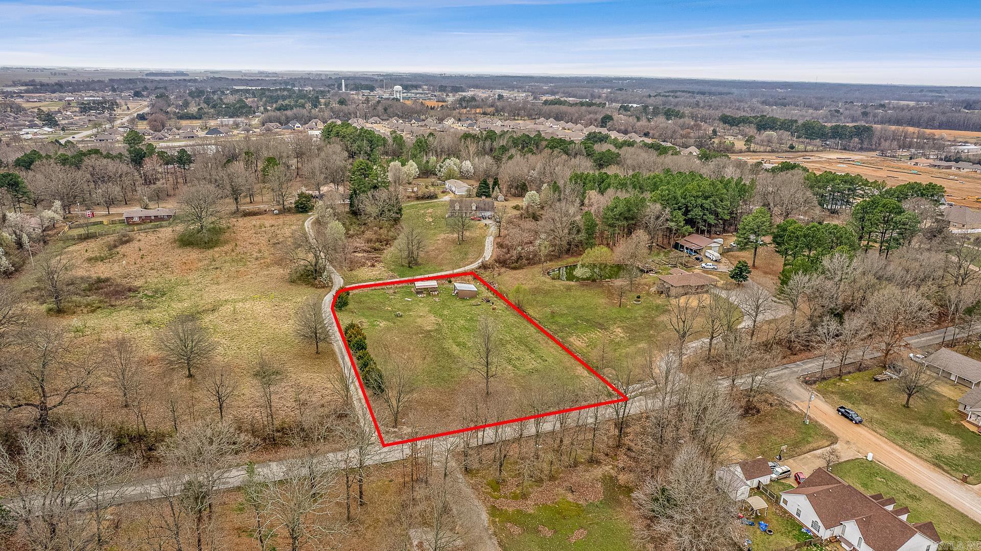 Great opportunity to build your home in the growing Brookland area. This 1.43 acre tract located at 145 County Road 762 is cleared and ready for construction, offering a great setup for someone looking to build in a quiet rural setting. The property sits on paved County Road 762, a rare and valuable feature for many buyers in the area. Improvements include a newly built lean-to metal building and a greenhouse, adding immediate functionality and value to the property. A great place to start building your future in the Brookland community.