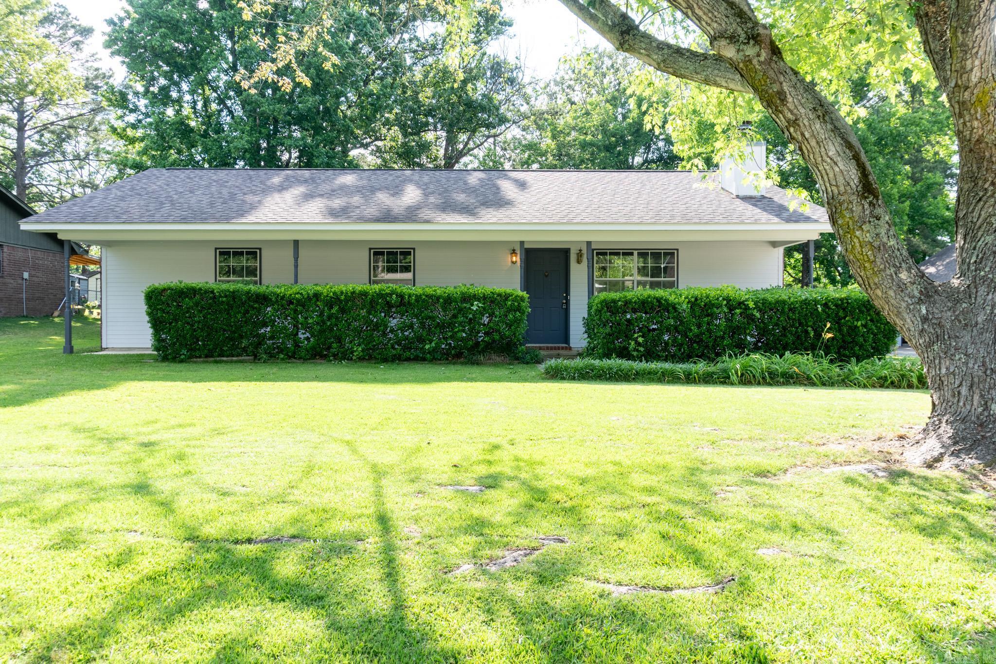 Charming, timeless & impeccably maintained, this inviting home offers the perfect blend of comfort, character & peaceful living. Nestled on a beautiful 1 acre lot, this property has been lovingly cared for over the years and radiates warmth from the moment you arrive. Inside you'll find gorgeous LVP flooring, cozy fireplace that creates the perfect gathering space & a layout filled with charm and functionality. While the home carries a touch of class & character, it's exceptional upkeep & welcoming feel make it truly special. Outside enjoy the spacious fenced backyard. The patio offers the prefect spot for morning coffee or evening unwinding. A large 2 car carport rear entry, provides convenience & privacy. Quaint, elegant & full of potential, this home is a rare opportunity to enjoy space, serenity & a property that has been genuinely cherished. DON'T MISS THIS ONE!
