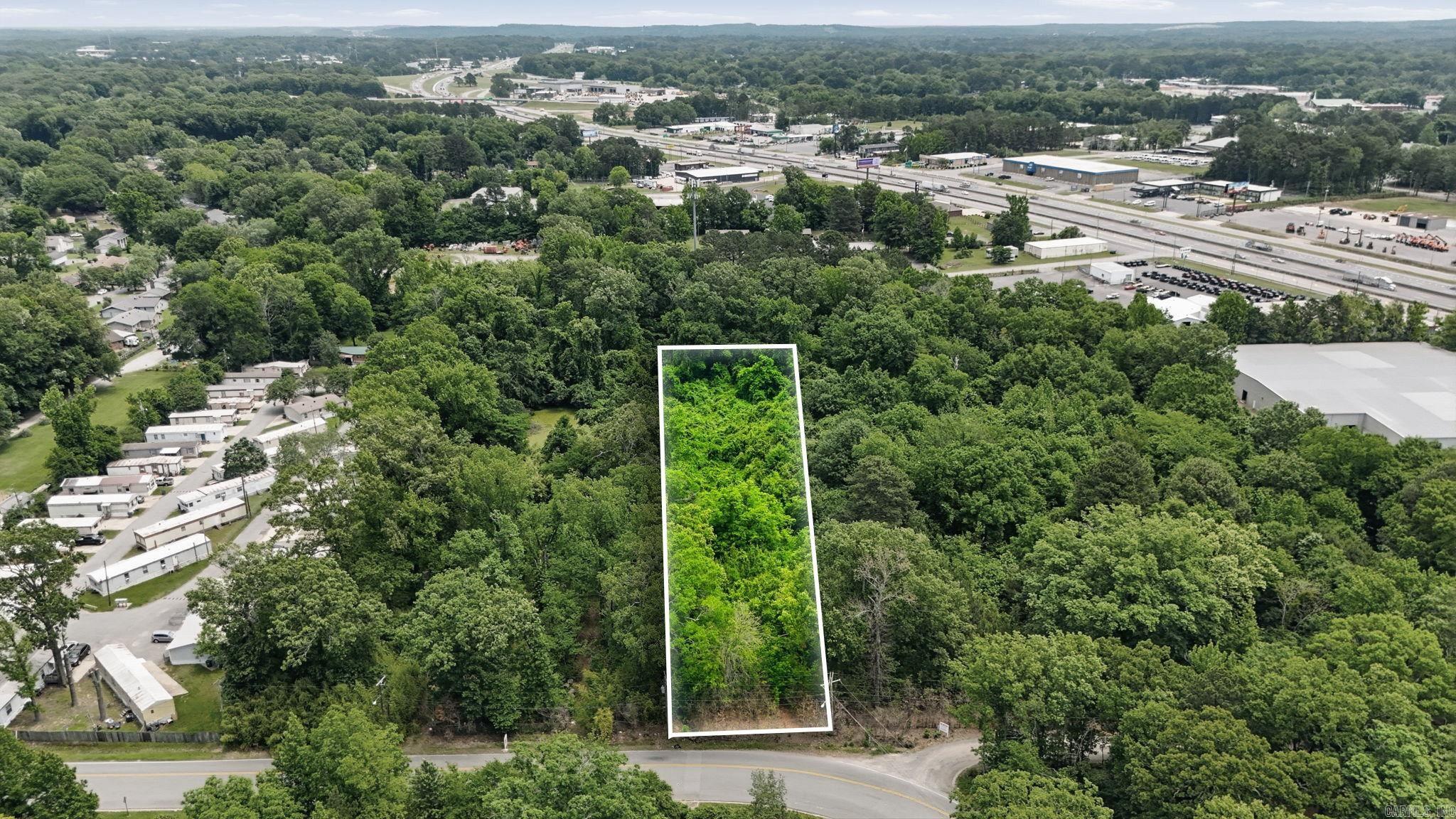 Prime opportunity in a growing mixed-use area! This 1.83-acre property offers endless possibilities for development, investment, or possible future business use. Conveniently located with easy access to Interstate 30, this property is near established businesses, increasing traffic, and ongoing growth. With excellent visibility and strong potential for commercial development, this is a rare opportunity in a highly accessible location. Whether you’re looking to build, invest, or expand, this property offers the flexibility and location to bring your vision to life at an affordable price.