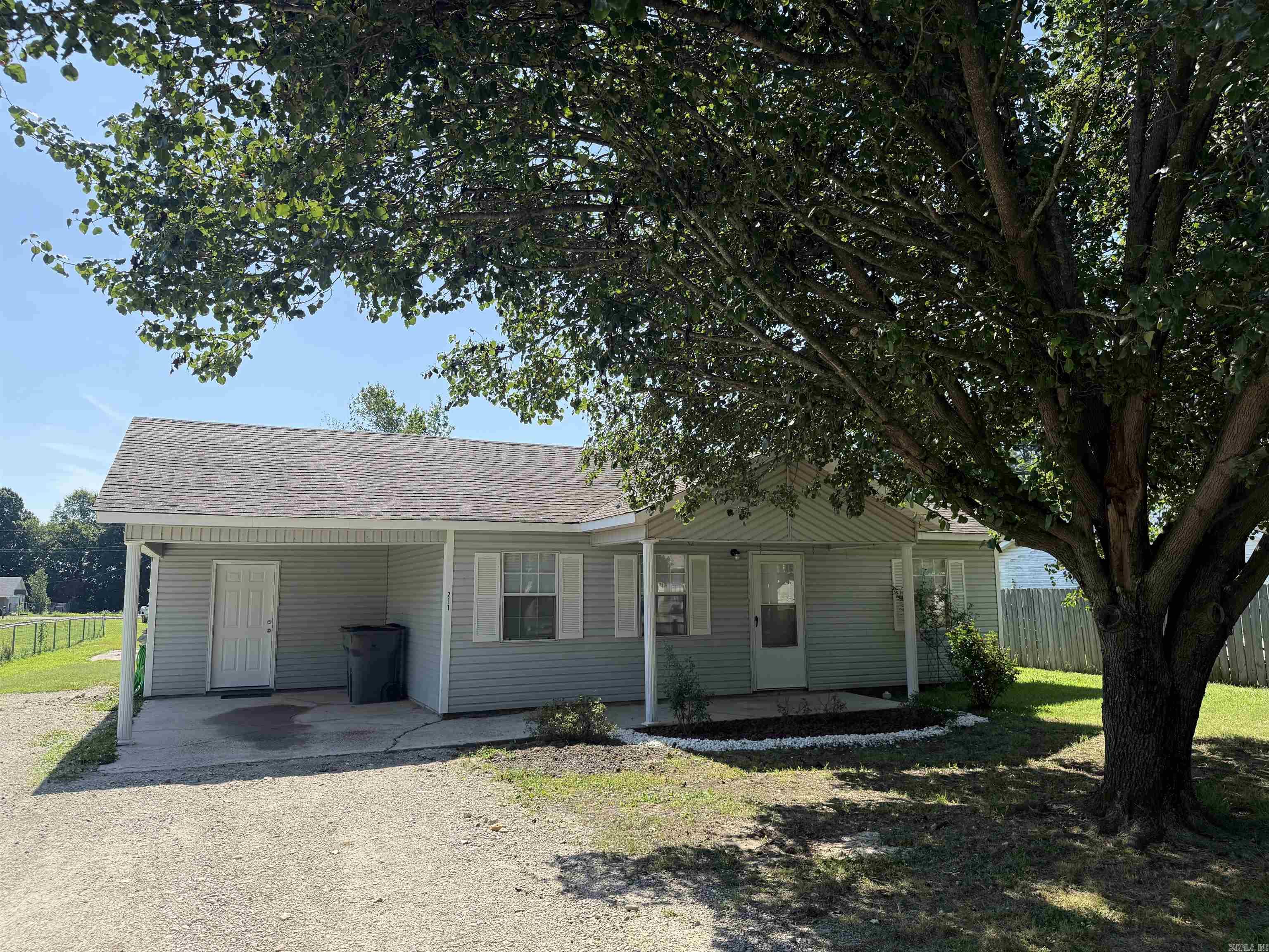Super cute and move-in ready! This beautifully remodeled 2-bedroom, 1-bath home features fresh paint throughout, new flooring, and an updated bathroom. Enjoy the spacious, partially fenced backyard, and covered back patio, perfect for entertaining! Additional features include in-ground storm shelter for peace of mind and a convenient 1-car carport.  Whether you're a first-time homebuyer, downsizing, or looking for an investment property, this charming home is one you won't want to miss!