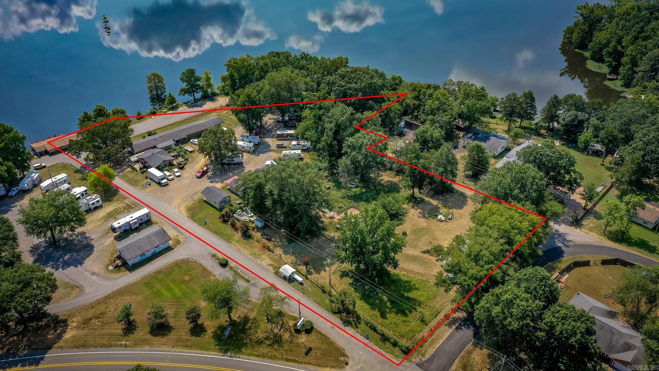 Unique Commercial Opportunity on Harris Brake Lake  This one-of-a-kind property offers multiple income streams and a prime lakeside location. Features include:  1) Retail store directly on the lake,  2) Motel with 8 units, all facing scenic Harris Brake Lake,  3) Four charming cottages,  4) Laundry and restroom building for guest convenience,  5) 15 RV trailers included in the sale,  6) 40 RV parking spaces for additional guests or rentals,  7) Propane Refill.  Whether you’re looking to operate your own hospitality business or invest in a versatile income property, this is the one you’ve been waiting for!