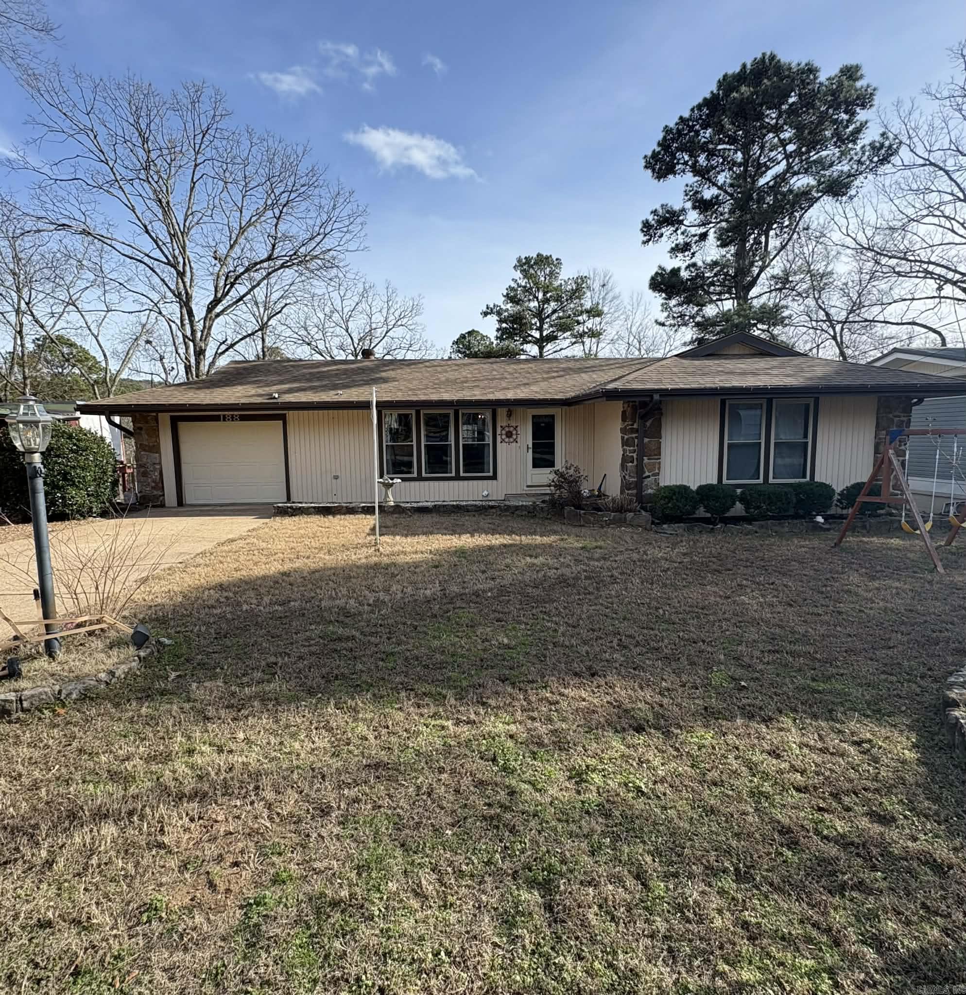 Great updated home in the lovely city of Fairfield Bay.  Greers Ferry Lake is just minutes away and all the amenities Fairfield Bay has to offer....putt putt golf, 2 beautiful 18 hole golf courses, fine dining, pools, bowling alley, shopping, 90 miles of ATV trails, hiking trails, Indian Rock Cave, tennis courts, the Hart Center and much much more.  The home features a new roof, butcher block counter tops, updated bathrooms, farm house/barn sliding doors and fire pit in the newly leveled back yard, along with more updates too numerous to mention.  Don't let this one get away.  Call today to view this wonderful home in the Bay.