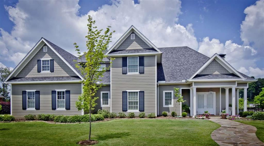 Spacious Custom built 5/5/1 Lake Home situated on a level lot with 130' of Lake Hamilton Frontage. Attention to  detail apparent in every space. Open living area downstairs provides room for entertaining while enjoying the lake views. 3 zoned H&A units, 2 tankless WH, Security system. Kitchen features quartz counters, large Island, Double Oven, Convection Oven and SS Appliances. Wet Bar w/ Wine Cooler, Ice Maker. Large Laundry Room. Whole Home Generator. E-Z Porch Enclosement Panel. 2 Docks, 2 Lifts convey.