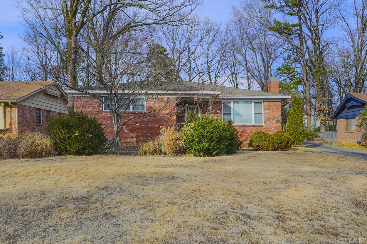 Lovely 3 BR/2 BA home in the heart of midtown!  Updated kitchen with large island and bar.  Kitchen is open to the den for easy entertaining.  Additional living area that adjoins a step up dining room.  Large primary bedroom with two closets and bathroom.  Two guest bedrooms with nice closets.  There is also a laundry room and office.  Fully fenced and private backyard with a stone patio.  Sprinkler System.  Detached oversized workshop/garage.  Come See!  Agents see confidential remarks.