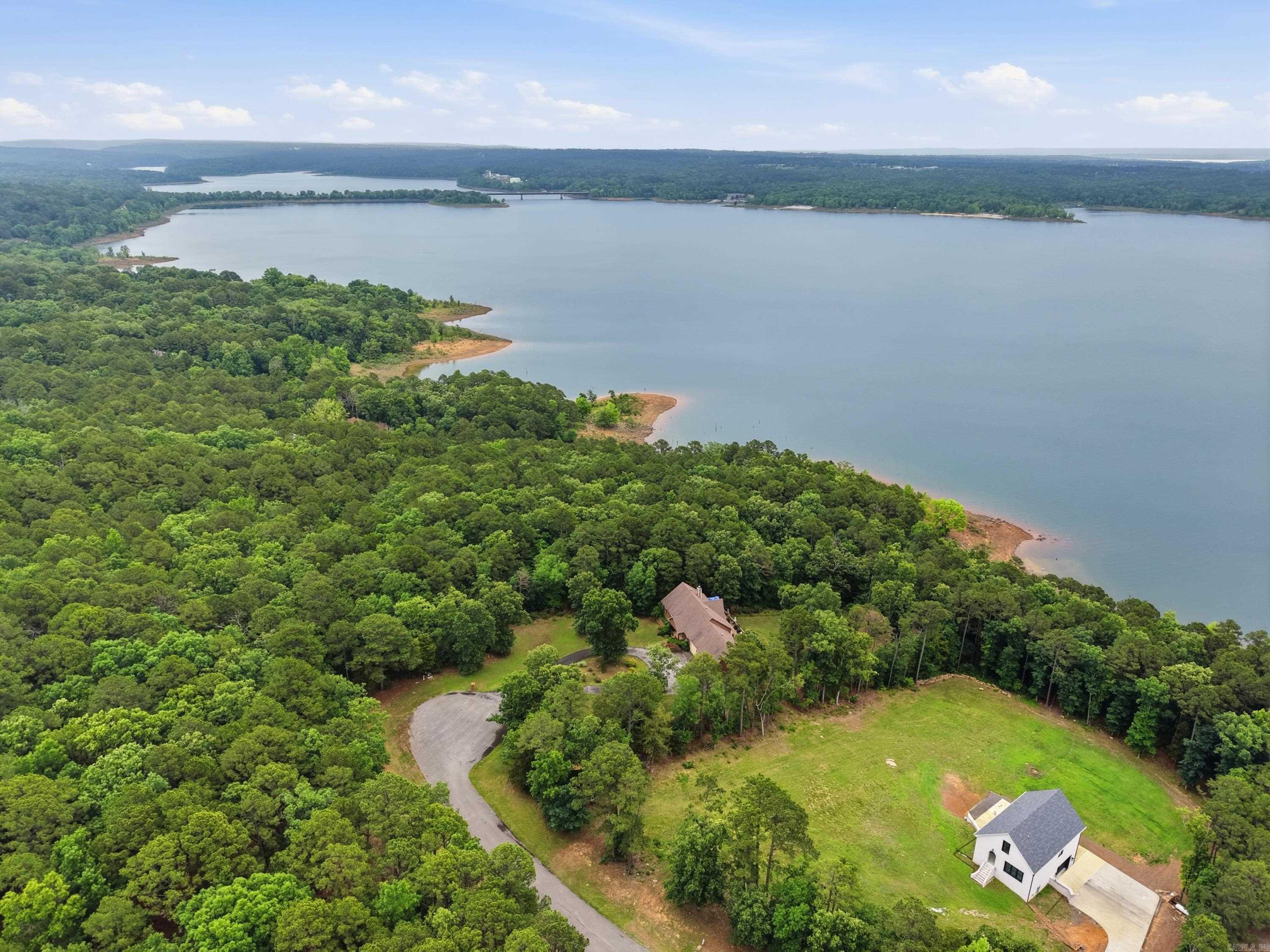 Discover the beauty of lake living in Edgewater Subdivision in Edgemont, Arkansas! These beautiful lake view lots offer the perfect opportunity to build your dream home or vacation getaway overlooking stunning Greers Ferry Lake. Enjoy peaceful surroundings, scenic views, and easy access to nearby marinas, boat launches, fishing, swimming, and all the outdoor recreation the area has to offer. Nestled in a quiet and desirable subdivision, these lots provide the ideal blend of privacy and convenience while being just a short drive to Greers Ferry, Fairfield Bay, restaurants, and shopping. Whether you are looking for a full-time residence or secondary home, these lake view properties are ready for you to make your vision a reality. Utilities available at the road. Don’t miss your chance to own a piece of Greers Ferry Lake paradise!