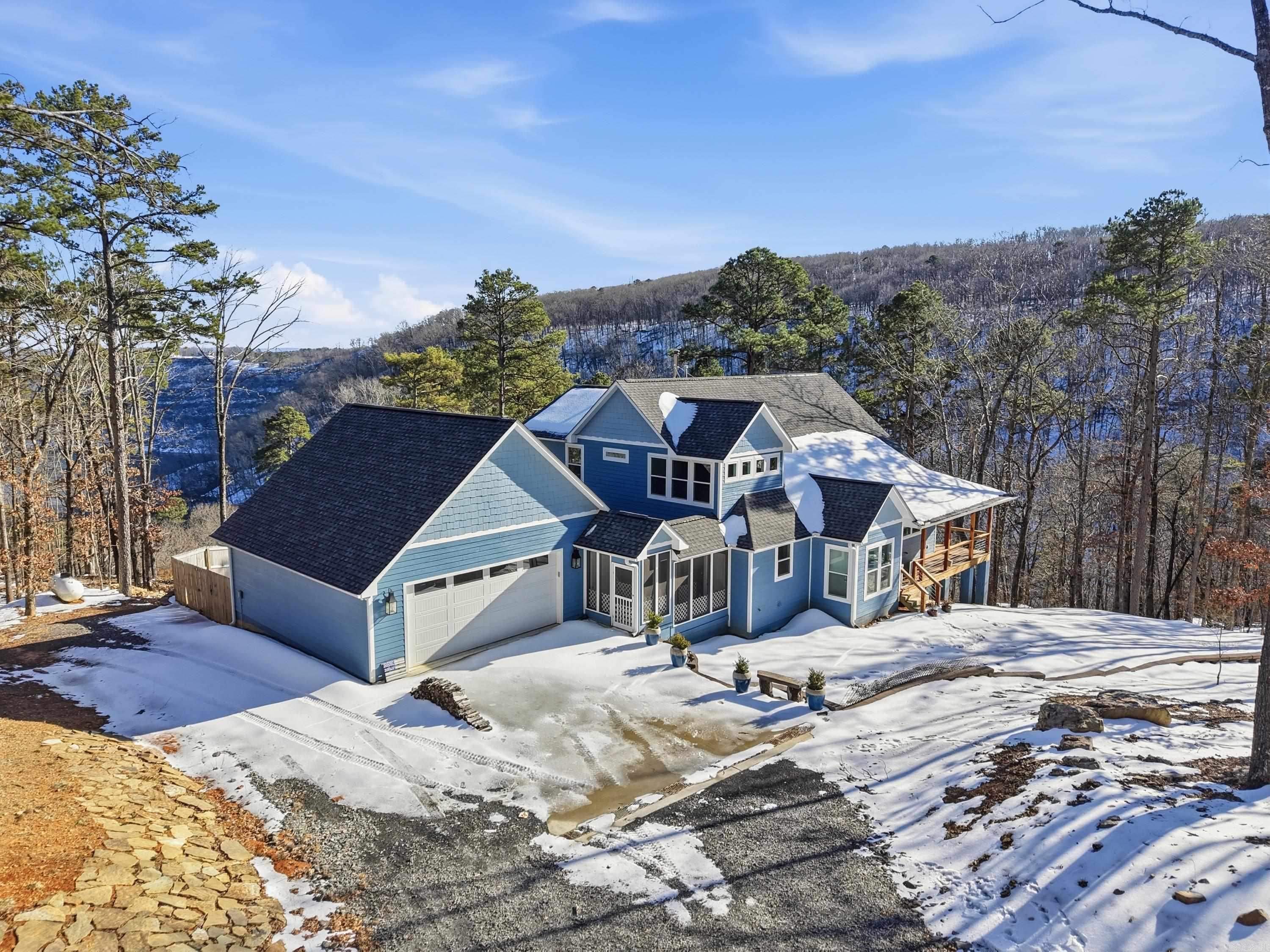 Looking for Seclusion on 82 acres w/STUNNING YEAR-ROUND views of Greers Ferry Lake/the Ozark Mountains, newer home just built in 2023, a private gated entrance, a mile of manicured ATV trails through dense woods, plenty of wildlife , & a public Boat Ramp at the end of Leech Dr, well this is the property for you!The Home features 2317sqft. of Living Space w/approx. 900sqft of covered porch, in addition to the unfinished basement that has about 1,400sqft of heated & cooled space including the "Safe Room" & access doors to park your ATV. You will also find a breezeway from the home leading to a 30x30 insulated garage, large doggy door leading into a fenced in area for the pets to play, Real Hickory Wood Floors throughout home w/exception of laundry room & bathrooms that have Stone Tiles, Granite countertops in bathrooms, Granite countertops in kitchen w/the leathered granite kitchen island.Appliances include KitchenAid Gas range, KitchenAid microwave, KitchenAid oven, GE Profile Refrigerator, GE Profile Washer&Dryer, On Demand Tankless Gas water heater, WHOLE HOUSE Generator, & cozy up to the Wood Burning Stove.All appliances stay,Furniture items are negotiable separately.(See docs.)
