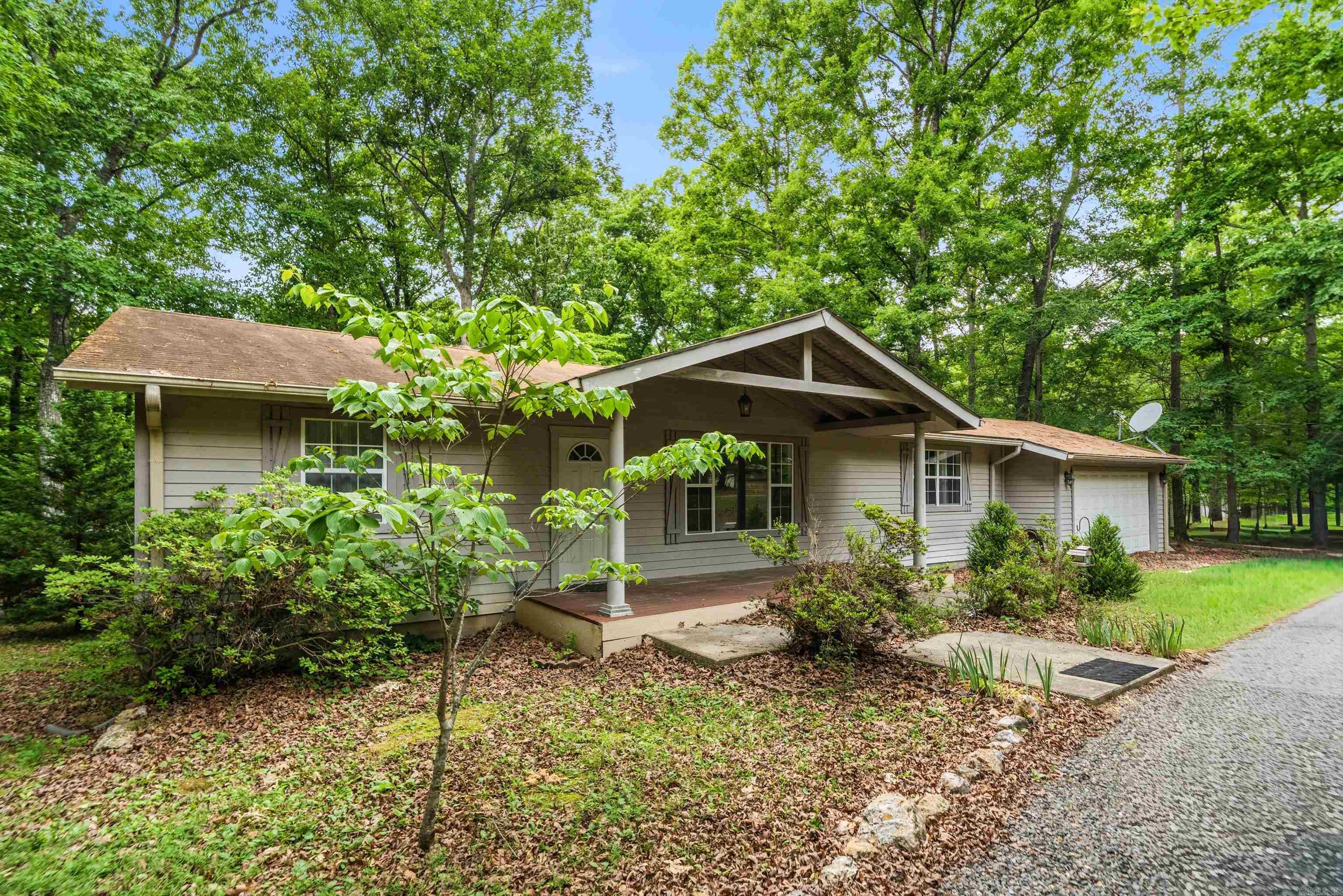 Don't miss this charming 3-bedroom, 2-bathroom home, ideally located near all the attractions Hot Springs has to offer! Set on a peaceful half-acre lot, this property features a convenient separate laundry room, a large fenced backyard, and generously sized bedrooms. Whether you're a first-time buyer, growing family, or investor, this one has incredible potential. Come check it out today!