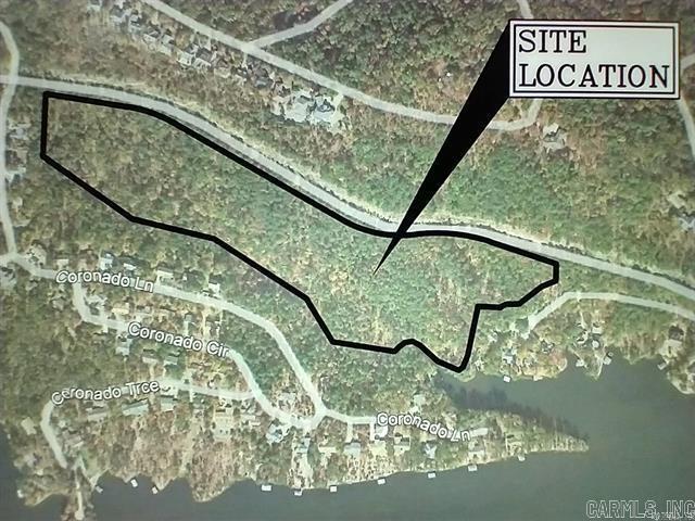 21.9 sub dividable acres with 418 feet of lake frontage in Hot Springs Village! This exceptional tract offers many thousands of dollars in timber value, allowing for selective thinning to enhance sweeping lake views while preserving privacy and natural beauty. The property feels like your own park style sanctuary, ideal for a private estate or family compound. Water, sewer, and electricity are available, simplifying future development. Located within the 26,000-acre gated Hot Springs Village Property Owners Association, offering security, amenities, and a one-of-a-kind lifestyle. A truly unique waterfront land offering with flexibility, value, and vision.