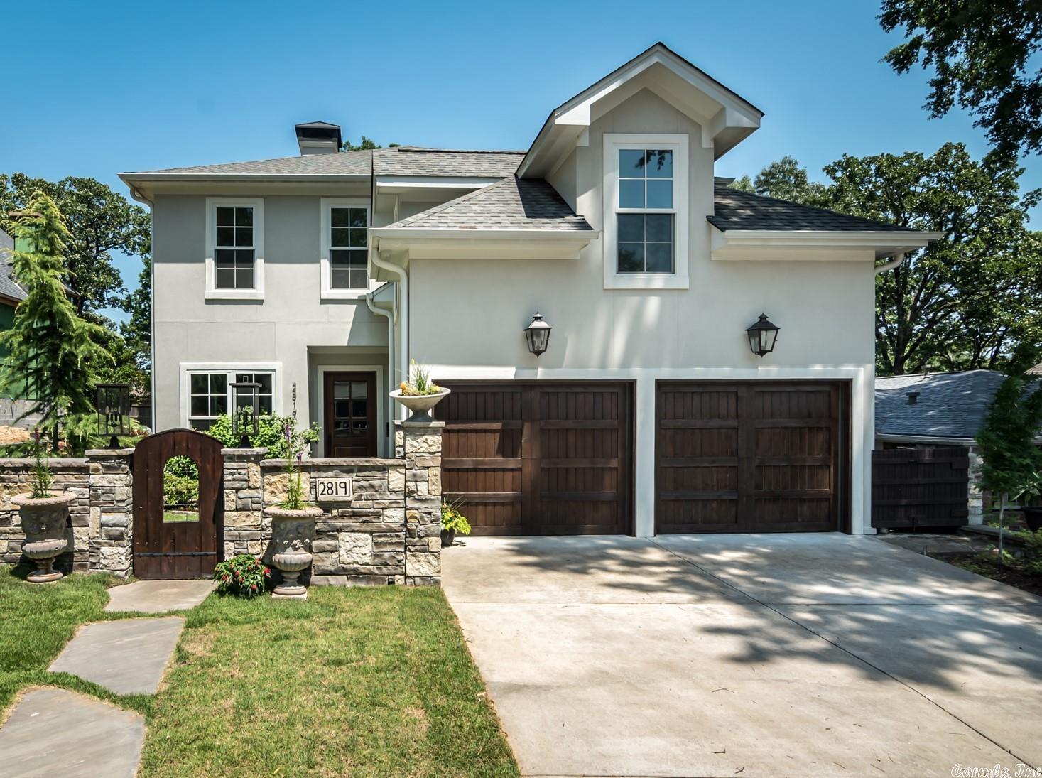 Just like new this 3 yr old home features large open rooms w/ tall ceilings, 8 ft doors & designer amenities. Huge kitchen w/ expansive island and exceptional cabinetry, office/study, primary suite w/ Carrara marble bath & super-sized closet.  Upstairs - 2nd living space plus flex room that could be 5th BR. 2nd primary suite w/ free standing tub and separate shower.  Extensive landscaping recently added includes covered side porch, front courtyard and stone walks.  Covered tile patio w/ FP and nice backyard