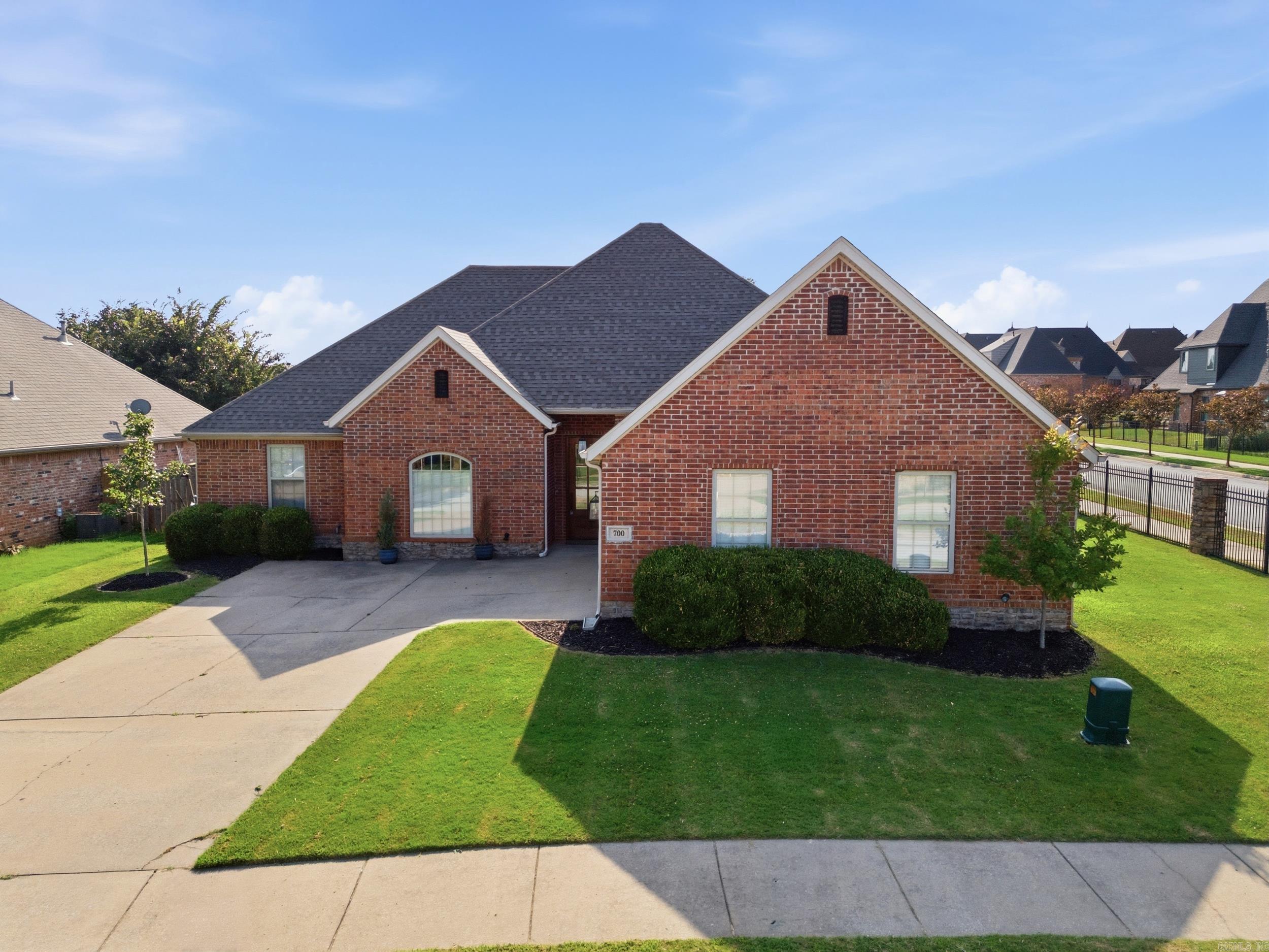 Welcome to this immaculate, move-in ready home that's been thoughtfully upgraded and priced to sell! Step inside to find beautiful new tile flowing through the kitchen and breakfast nook, freshly painted kitchen cabinets that give the heart of the home a crisp, modern feel, and a stunning upgraded primary bath featuring a tile surround walk-in shower, updated countertops, and new mirrors. Brand new exterior siding completes the fresh, well-cared-for feel. The spacious, smartly designed layout offers 3 bedrooms on the main level plus a dedicated home office, perfect for working from home. You'll also love the large laundry room and the oversized upstairs bonus room that flexes effortlessly into a media room, playroom, or guest suite, whatever fits your life. Step outside to a generous, fully fenced backyard that's ready for weekend cookouts, room for pets to roam, and space for the kids to play. Tucked just off Elm Tree Road, you're minutes from top-rated schools, parks, shopping, dining, and all the charm and energy of downtown Bentonville. This one truly has it all. Schedule your showing today before it's gone!