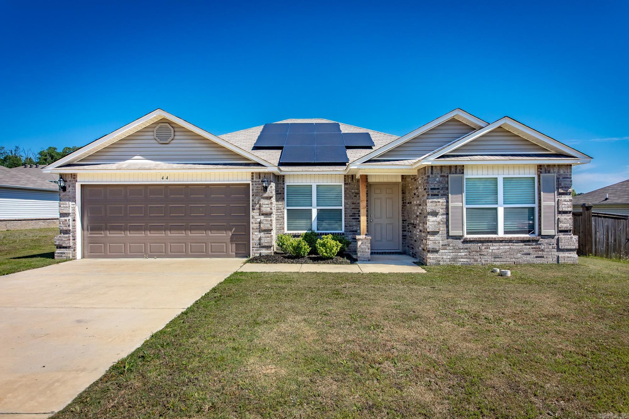 Welcome to this beautifully maintained 4-bedroom, 2 bath home offering the perfect blend of comfort, efficiency and convenience.  Featuring a spacious and functional layout, this home provides plenty of room for both everyday living and entertaining.    Enjoy the benefits of solar energy with NO SOLAR LOAN TO ASSUME. The solar panels will be PAID OFF in full before closing.