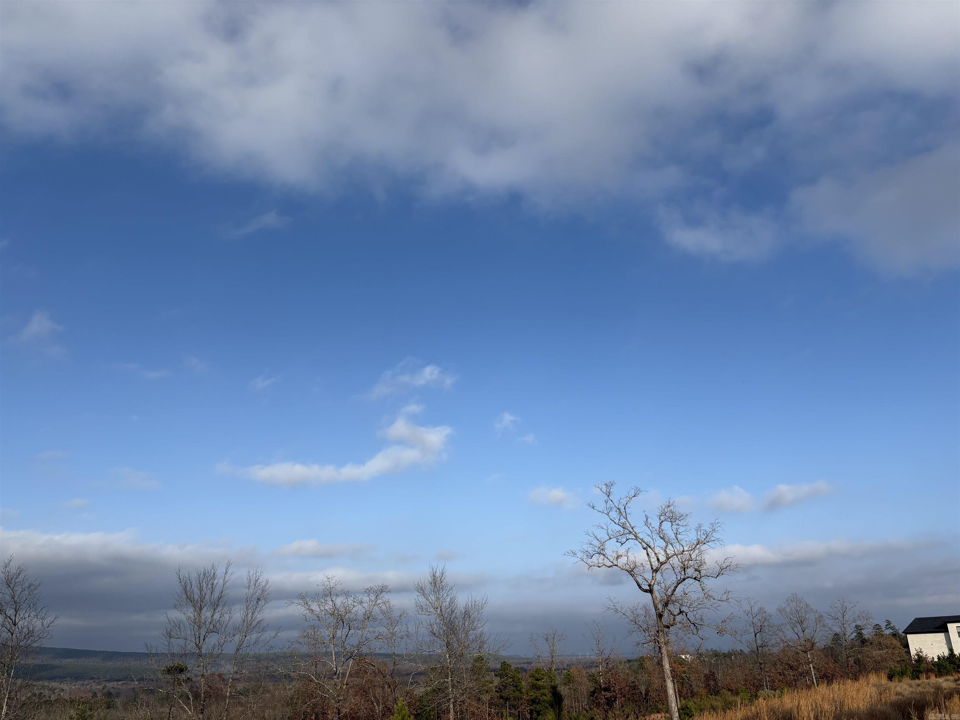 This track of land is overlooking the Northern mountain range and a natural valley. This lot is located in the gated Waterview Estates neighborhood with amentites such as a basketball court, football field, soccer field, pickleball court, tennis court, miles of nature walking trails, community bonfire area, among more amentities. Very unique development offering lots of all sizes and prices with all sorts of different views, many of which overlook Lake Maumelle, all backing up to green space to have the natural air and secure feeling of your own space.