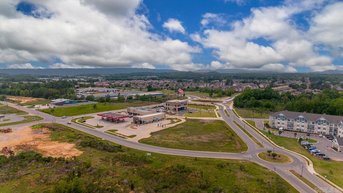 Rare commercial development opportunity in Maumelle’s growing White Oak Crossing / Diamond Park corridor. This ±1.213-acre corner pad site offers excellent visibility, strong access, and a prime position near established retail, residential growth, schools, and athletic complexes. Surrounded by active development and daily traffic generators, the property is well suited for restaurant, retail, medical, office, or service-oriented commercial use. Concept plan available for approximately 7,200 SF. One of the last remaining pad-ready opportunities in this immediate area.