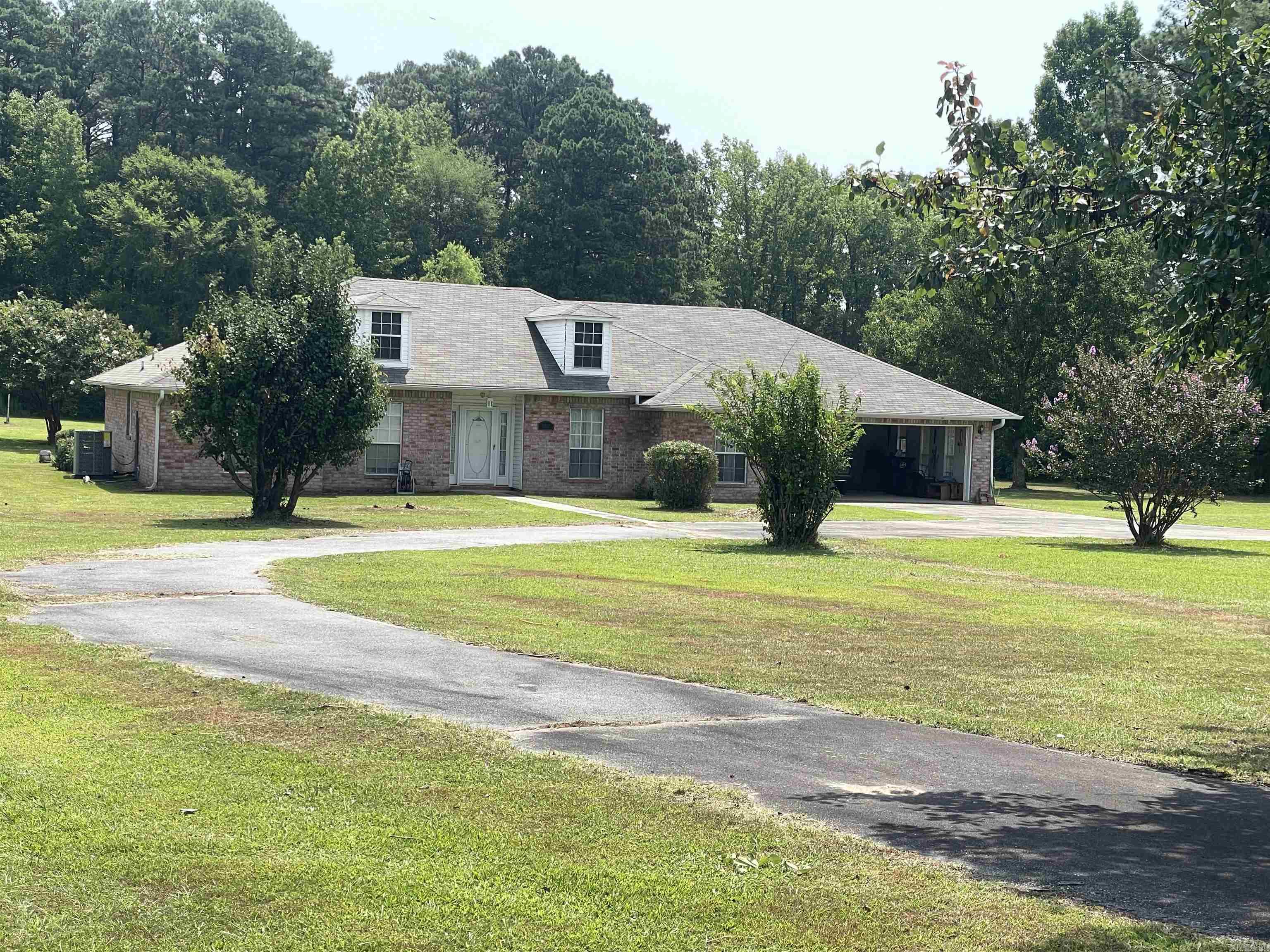 Need to move right in??? All the major items have been replaced! NEW HVAC, NEW Roof, NEW water heater, NEW Refrigerator!!! Come see this great home in the country with over 2.5 acres! 3 beds, 2 baths and plenty of great spaces with a vaulted ceiling and fireplace insert in the living room. Need an office? Got it! Need a formal living room for your Christmas tree? Got it! Need a separate dining room? Got it! Furniture to be sold at auction. Call me for a visit! Agents see remarks.
