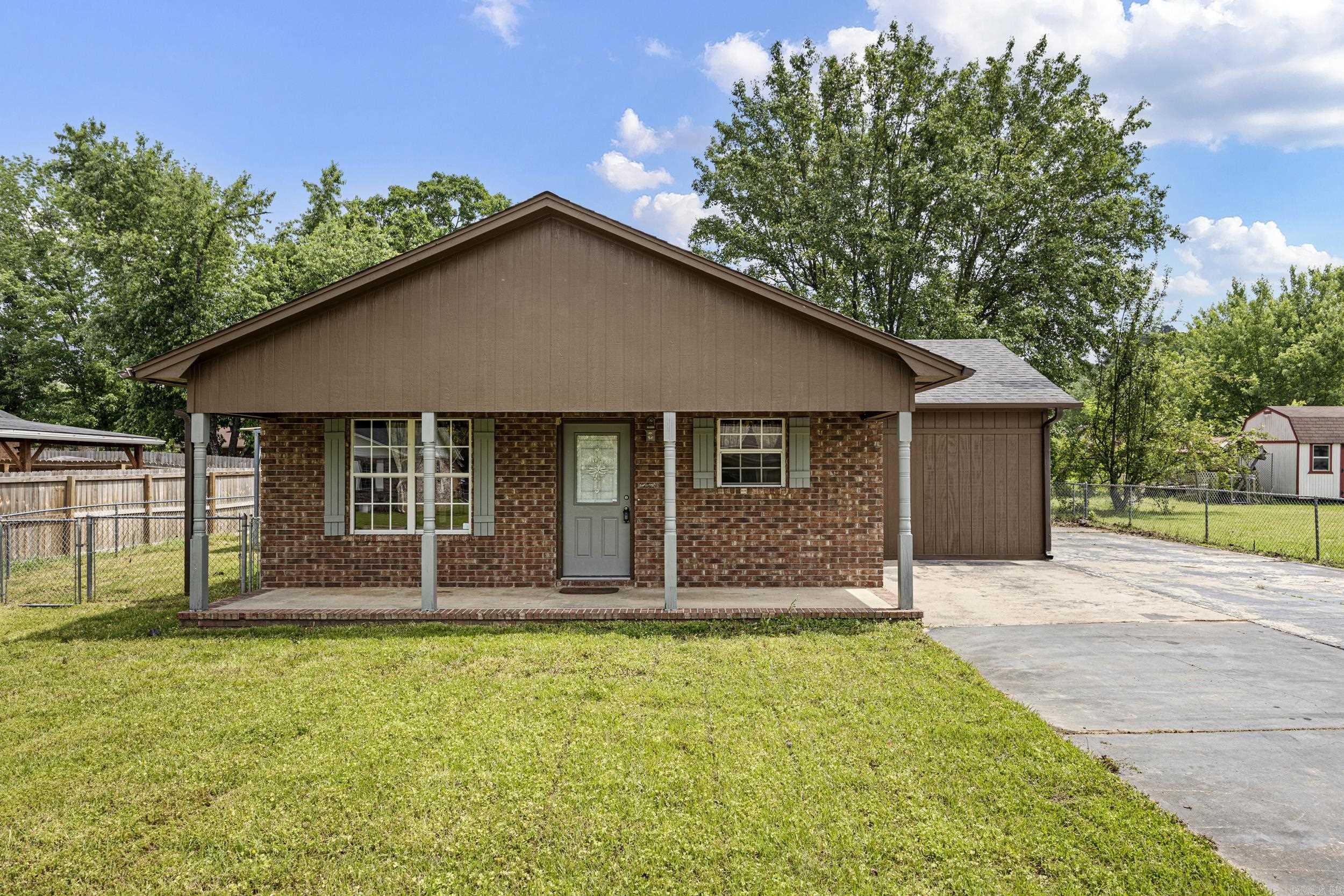 This inviting 4 bedroom, 2 bath home offers the perfect blend of space, comfort, and convenience. Inside, you’ll find a functional layout with ample room for both everyday living and entertaining, while the four bedrooms provide flexibility for family, guests, or a home office. Step outside to enjoy the spacious, fully fenced backyard ideal for kids, pets, or weekend gatherings. Whether you’re hosting a barbecue or simply relaxing at the end of the day, this outdoor space offers plenty of room to make it your own. Conveniently located just minutes from all the amenities Clarksville has to offer, including shopping, dining, and schools, this home puts everything you need within easy reach. Plus, enjoy peace of mind with a new HVAC system installed in 2025, adding comfort and efficiency for years to come. This property is a great opportunity for anyone looking for a well-maintained home in a prime in-town location. Schedule your showing today!