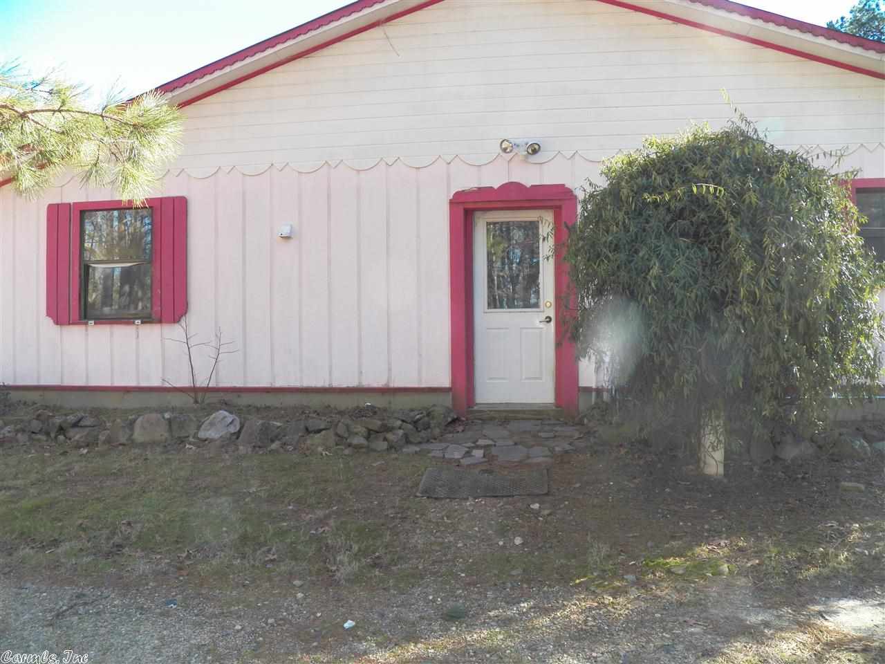 National forest boundary on this approx 20 acres with three 40X100 metal buildings, one of which has 1600 sq ft finished area.  In the past there were 2 commercial kitchens. There are 2 sinks, 2 gas ranges, a gas surface cook-top and a refrigerator in the kitchens.  1 full bath, and lots of storage.  One building is 36X40.  This could be a nice place for horses and living quarters. Close to Irons Fork Lake, with access to lake through the national forest.  Subject to restrictions. Inside has been updated.