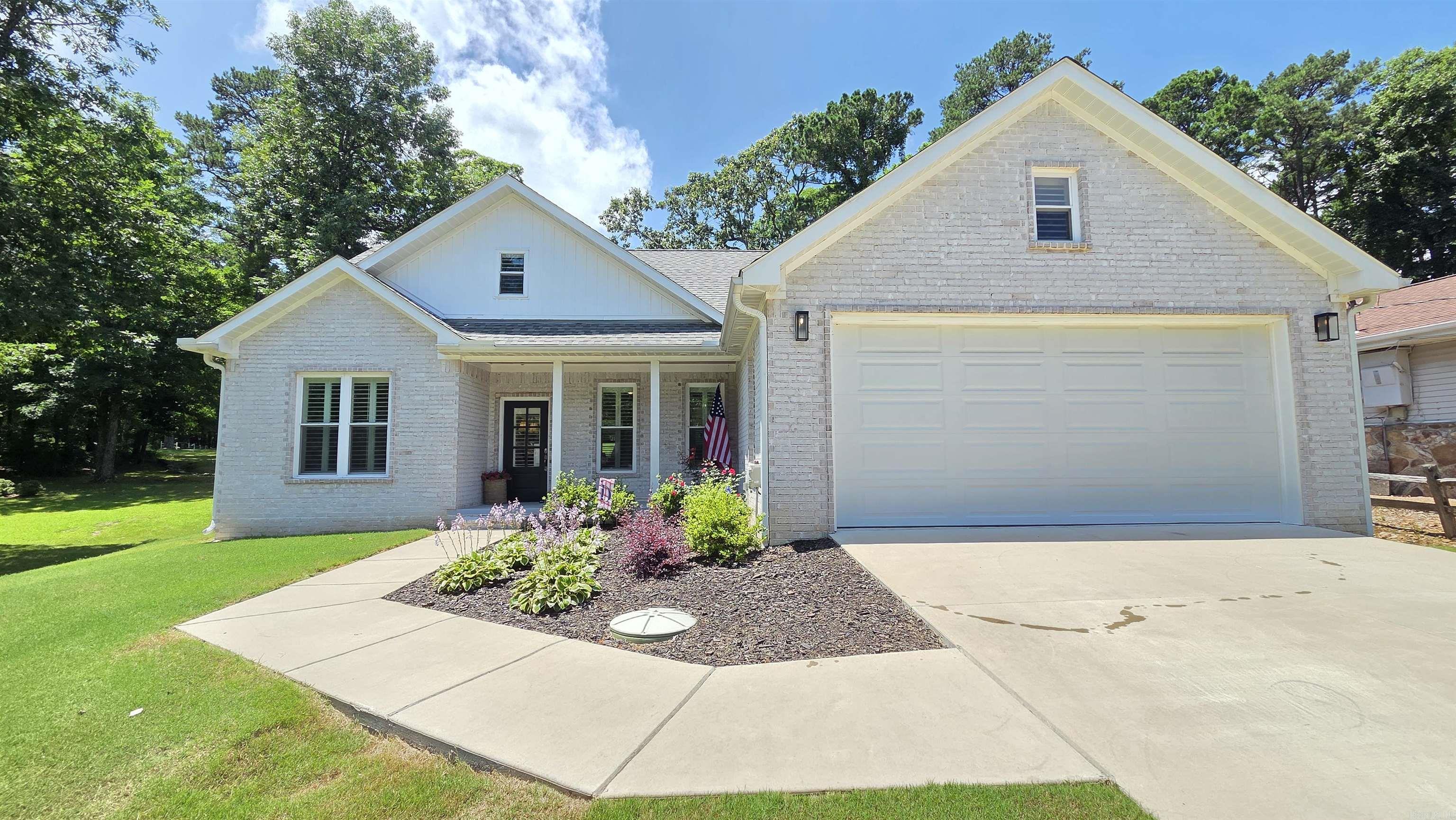 Live the resort lifestyle you’ve always wanted! This stunning newly built brick home offers modern finishes and all the upgrades everyone loves. Enjoy an open, bright layout perfect for comfortable living and entertaining in the heart of the beautiful Ozark Mountains. Located directly on the Indian Hills Golf Course, this modern home puts you steps from year-round recreation. Fairfield Bay boasts two golf courses, mini golf, pickleball, bowling, disc golf, approximately 90 miles of trails, 6 miles of hiking trails, a pristine clear-water lake with marina, and so much more! Whether you’re looking for a primary residence or a fantastic vacation/investment property, this is your opportunity to own in one of Arkansas’ premier resort communities. Come see this modern build today!