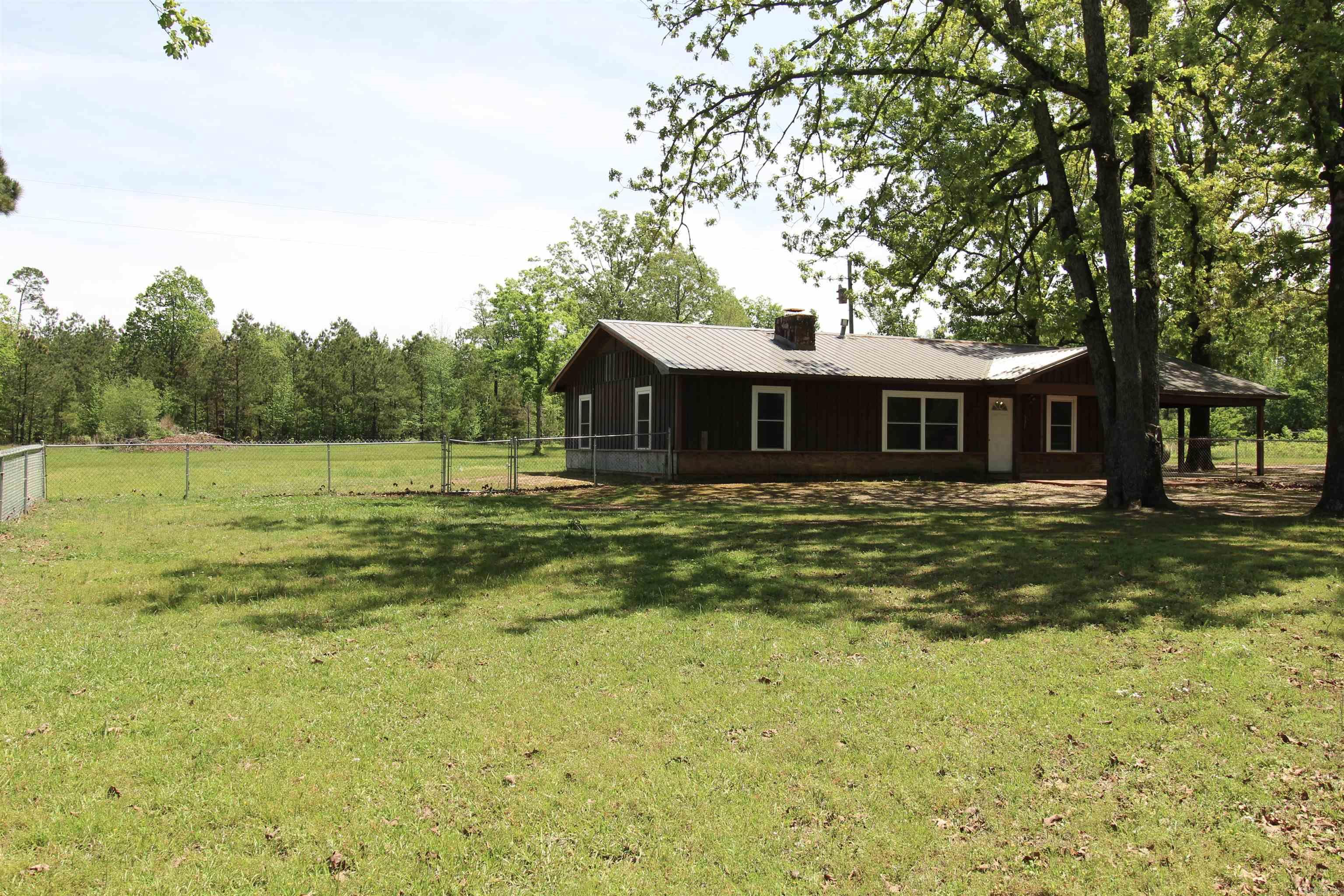 Come visit this country ranch home in the Shiloh Community just South of Sheridan AR. Home sets on 4.4 beautiful acres. 2024 HVAC, 2019 roof and windows. Also a 16x14 Utility Shed. Has plenty of space to grow in this peaceful community!!!
