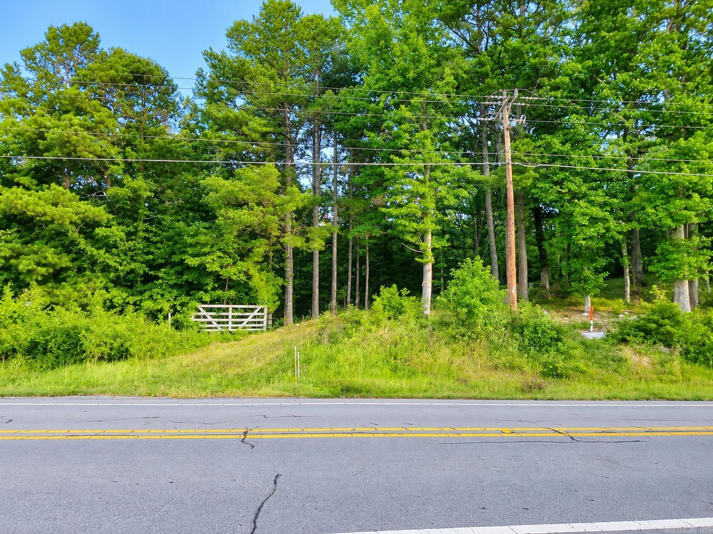 Prime piece of highway frontage, on busy US-270 W! This 0.55± acre property offers excellent highway frontage just minutes from Mountain Harbor Resort and only approximately 850 feet from the Joplin Store. Whether you're dreaming of a retail shop, restaurant, office, cabins, vacation rental business or another investment venture, this property offers endless possibilities. With high traffic exposure, easy access, and a location surrounded by year-round recreation, tourism, and lake activity, this is an exceptional opportunity to bring your vision to life.