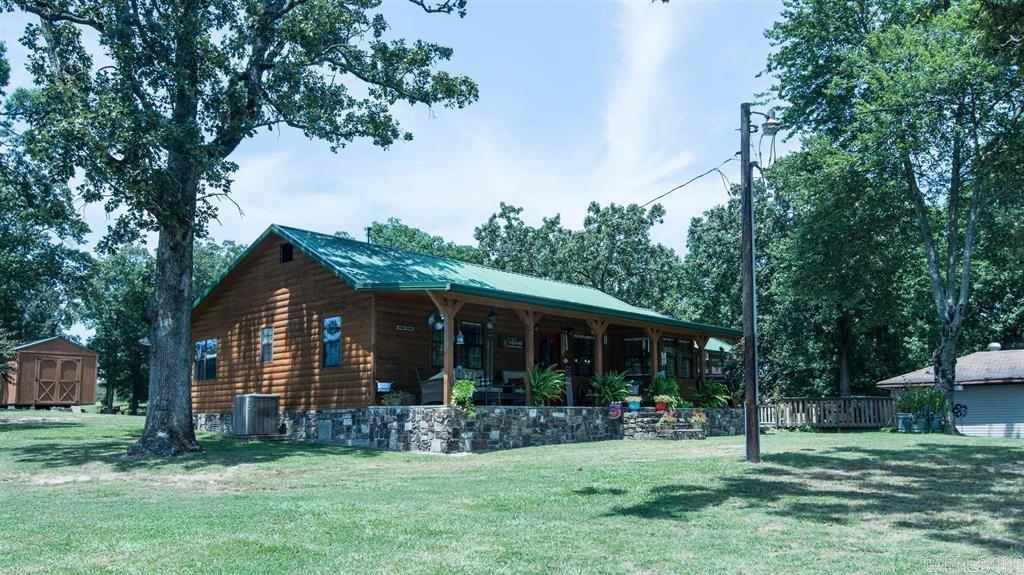 Beautiful 3 bed 2 bath on 1.5 acres with tons of features! Swimming pool w/ Jacuzzi! 450 sq ft. pool house! Highway frontage! Large 3 Car Garage with HVAC! Home remodeled in 2009! Beautiful counter tops! Fantastic Laundry Room! More Land available if needed!  Some Fencing on property with a couple of small sheds also.
