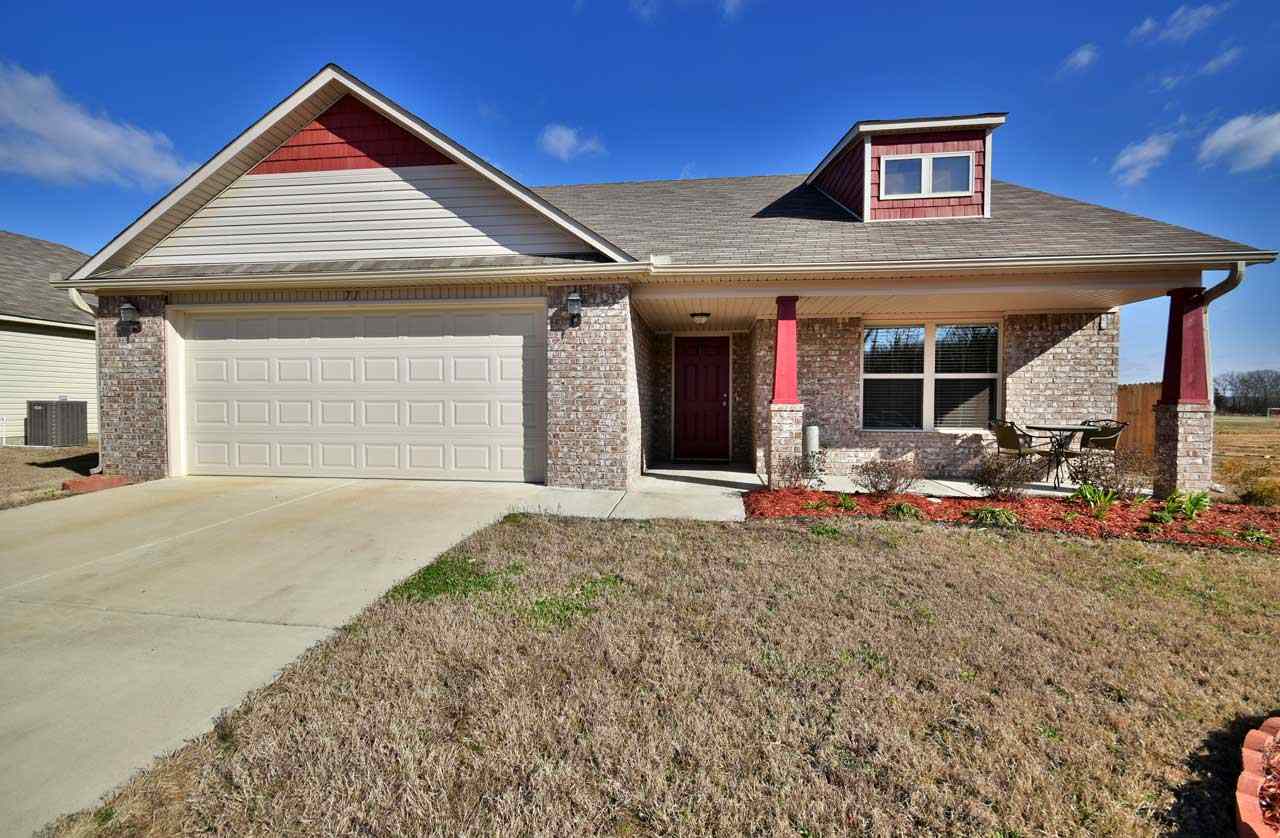 Quiet subdivision right next to East Side Elementary, dental offices, restaurants, and more.  This three bedroom, two bath home has beautiful hardwood floors throughout, granite counter tops, crown molding, separate tub and stand up shower, large walk in closet, fenced in back yard, front and back covered porch, and too much to list.  This is a must have floor plan!