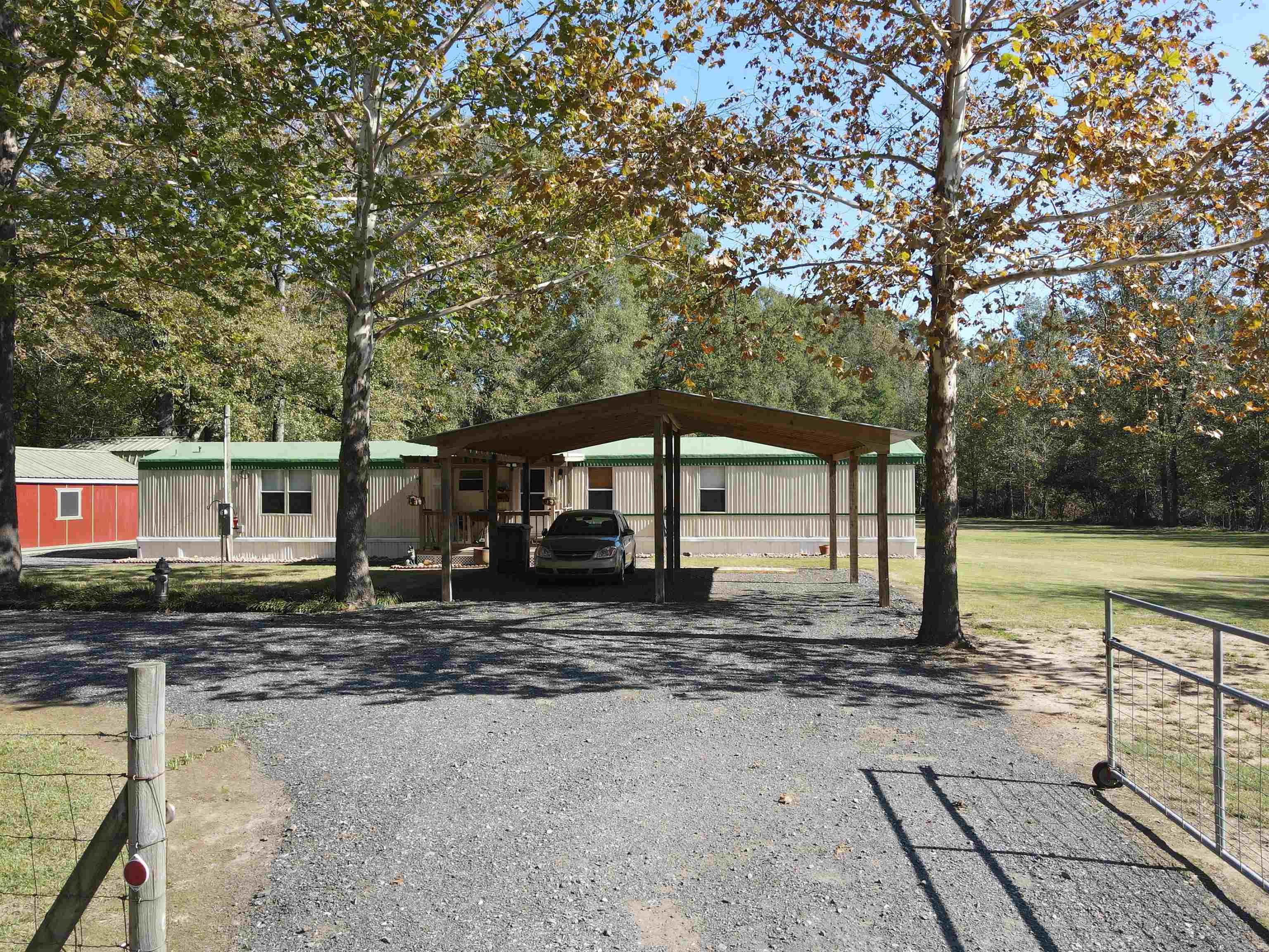 Discover this recently renovated, single-wide home in peaceful Ico, Arkansas. Seated on 3.6 picturesque, fenced acres with a pool, the house delivers comfort and style on a permanent foundation. Features include an open-plan interior with modern updates, a fully-equipped shop for hobby or business use, and an inviting outdoor entertainment area. Enjoy the tranquility and beauty of country living with the convenience of modern amenities in this stunning home. Back on the market at no fault of the seller.