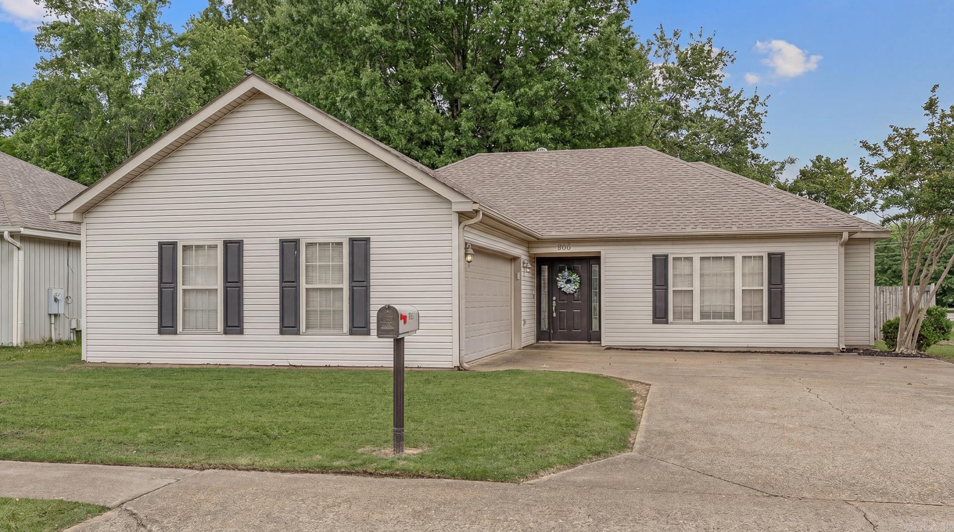 Welcome to this beautifully maintained 3-bedroom, 2-bath home offering 1,296 square feet of comfortable living space. This home is conveniently situated on a corner lot, just off of Harrisburg Road. This home features a split floor plan, designed for both functionality and privacy. The inviting living room showcases vaulted ceilings and a cozy gas log fireplace, creating the perfect gathering space. Recent updates provide added peace of mind, including a new roof installed and a beautifully updated master bathroom, both completed in 2023. The spacious primary suite offers a relaxing retreat with a jetted soaking tub and extra large walk in closet, perfect for unwinding after a long day. Step outside to enjoy the fully fenced backyard with ample room for pets, play, or entertaining guests. The corner lot layout also provides extra privacy and separation from neighboring homes. With major updates already completed and a move-in ready feel throughout, this charming home is ready to welcome its next owners.