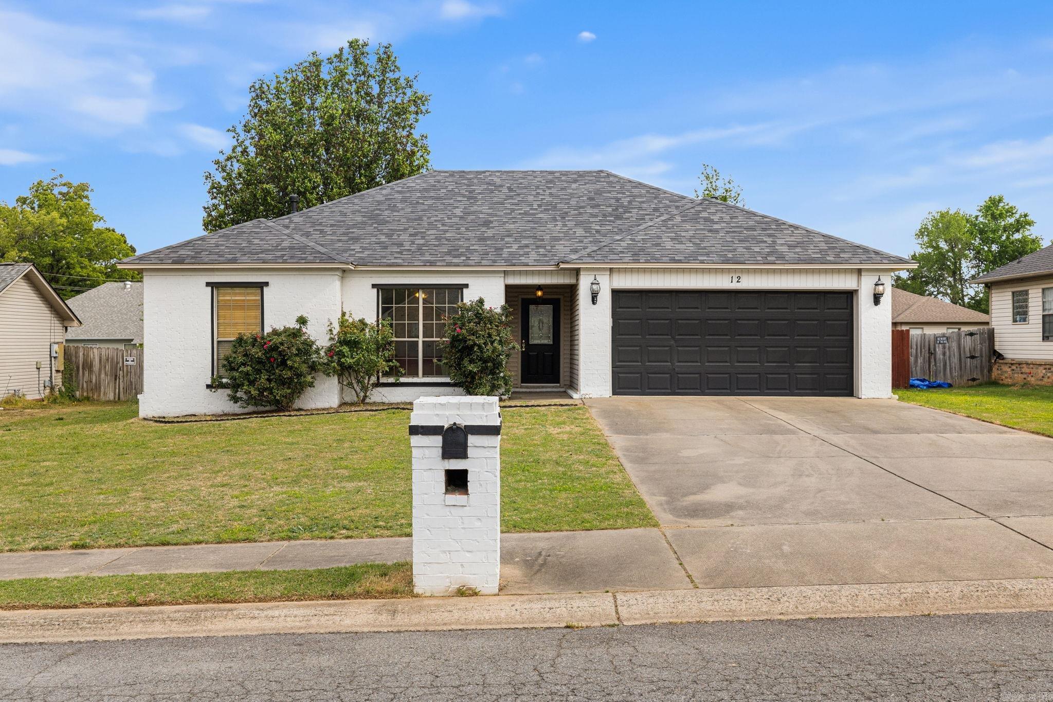 Charming 3 bed, 2 bath home offering 1,248 sqft in an established neighborhood conveniently located near local shopping, dining, and everyday amenities. This well-maintained home features an updated kitchen with freshly painted cabinets, newer appliances, and a 6-burner gas stove perfect for cooking and entertaining. Built-in desk area creates the ideal space for a home office or homework station. The spacious living room showcases tray ceilings for added character and charm. Bedrooms are generously sized and include walk-in closets. Enjoy the convenience of a separate laundry room and new flooring throughout the home with no carpet. Step outside to a fully fenced backyard complete with a deck, ideal for relaxing or entertaining guests. Major updates include a newer roof (2024), water heater (2024), and brand-new HVAC system installed in 2026. Don’t miss this great opportunity for comfortable living in a convenient location. Schedule your showing today! ***Agents see remarks.