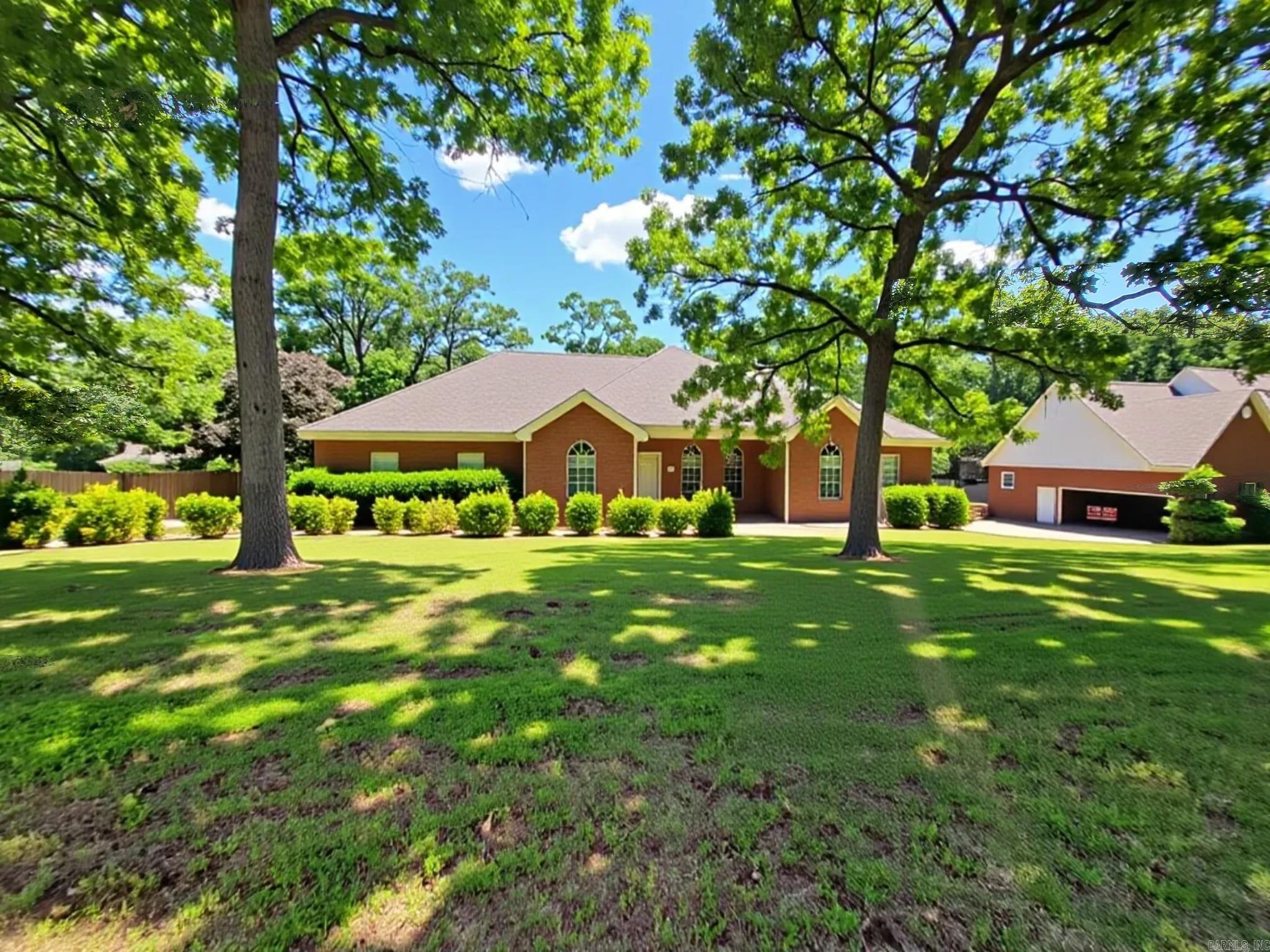 Located in the desirable Nix Lake/Robinwood area in Jonesboro, this spacious all-brick home offers 4 bedrooms, 3 baths, plus an office or flex room in one of Jonesboro’s most established neighborhoods. Surrounded by mature trees and homes supporting significantly higher price points, this property presents an excellent value-add opportunity with strong upside potential. Inside, you’ll find abundant natural light, a spacious primary suite with dual vanities, jetted tub, tile shower, and walk-in closet, plus a flexible split-bedroom layout. The partial walk-out basement, previously used as separate living quarters, offers additional space for storage, hobbies, recreation, or future customization.  Recent HVAC updates, a large entertaining deck, and a prime location near Parker Road shopping and dining—including Walmart Supercenter—make this a rare opportunity to personalize a home and build equity in the highly sought-after Nix Lake Estates area.  (Some photos are virtually staged and are for illustrative purposes only.)