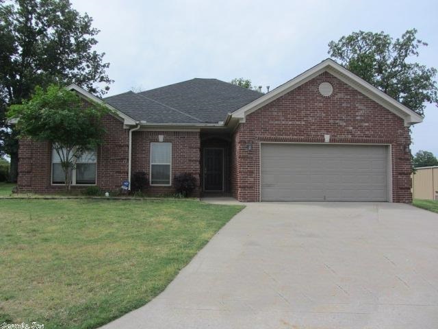 BASE MEADOWS 4-BEDROOM, 2-BATH BRICK HOME built in 2006 and loaded with nice features.  Wonderful split bedroom plan. Great room w/gas-log FIREPLACE!  Luxurious master suite with seated shower, jetted tub & 2 walk-in closets. Huge kitchen w/6-person bar, stainless appliances, corian counters & walk-in pantry. Unique display hallway. Beautiful wood laminate floors. Partially covered back porch overlooks nice fenced back yard with woods behind.  Custom blinds. Tilt-out windows for easy cleaning.