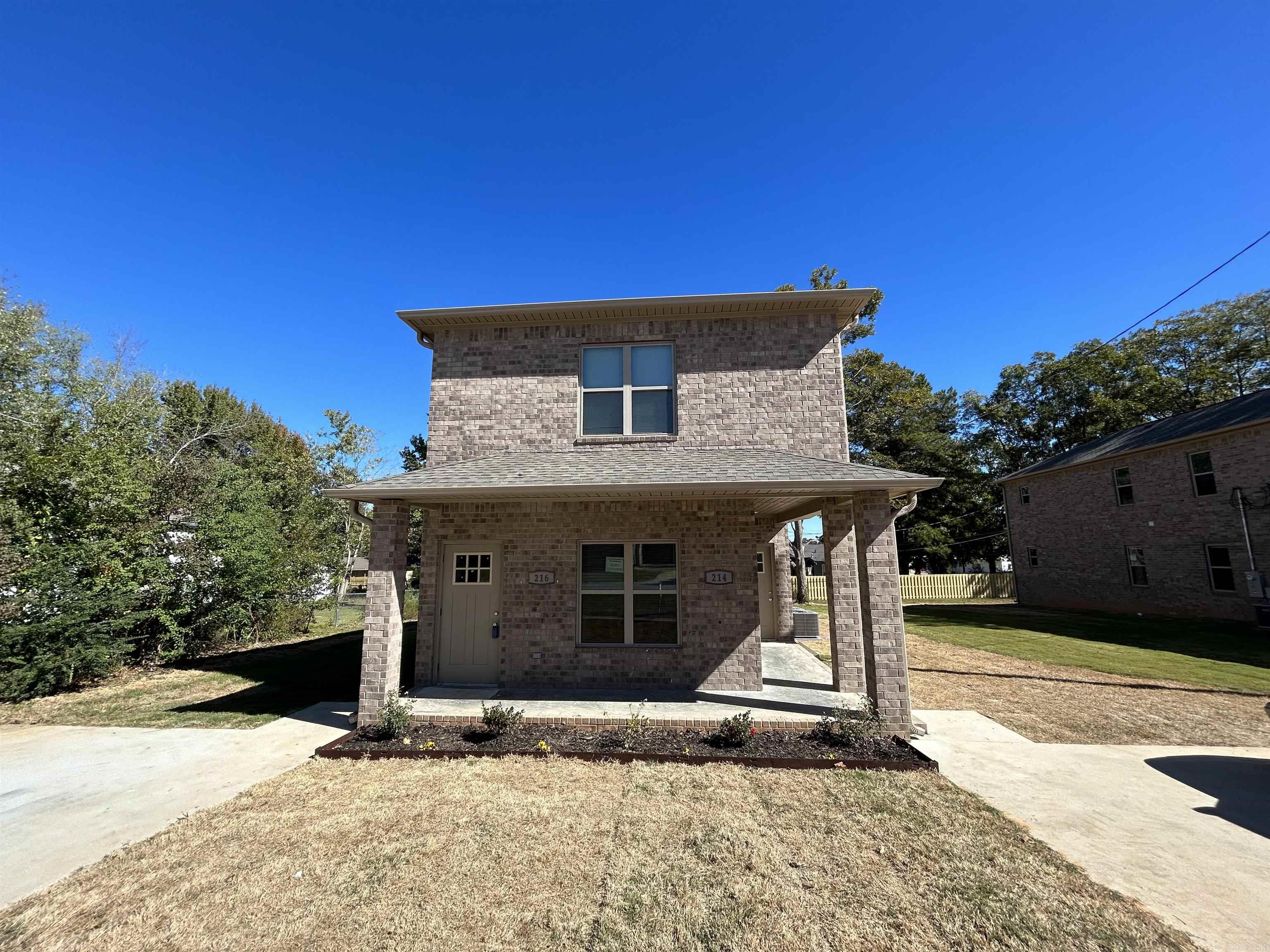BRAND NEW DUPLEX convenient to all the best Central Arkansas has to offer! Just over 2 miles to Little Rock Air Force Base and fifteen minutes from downtown Little Rock! FULL 3 bedroom/2 bath, one downstairs and one up. Eight (upstairs) and nine (downstairs) foot ceilings with a full brick exterior. Each floor has waterproof vinyl flooring throughout and a full laundry room. Granite countertops! Walk down the hall to the two bedrooms with ample closet space. Primary bedroom at the very back of the building with its own large closets and bathroom. Construction is COMPLETED!  This is one of two duplexes in a row for sale. This is the Left building.