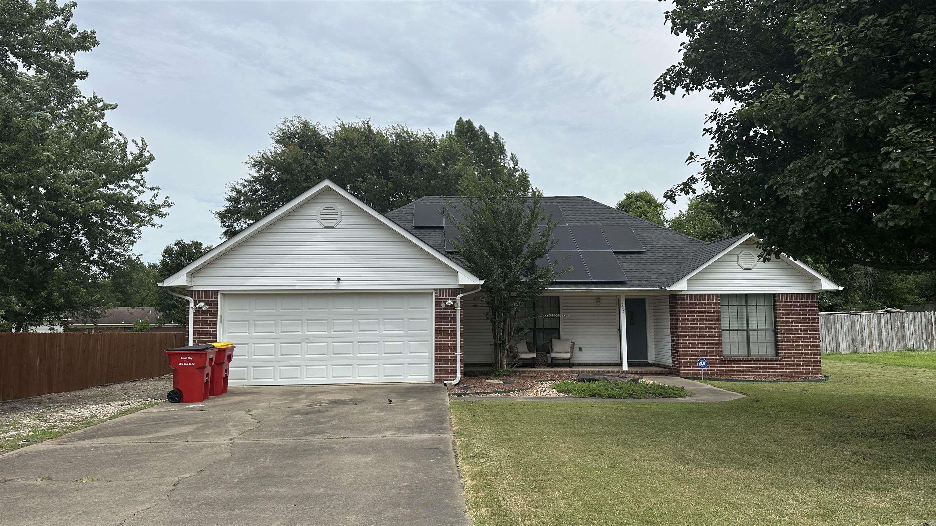 Nice well kept brick home in Morrilton.  Three Bedrooms Two Bath Split Floor Plan Solar Panels will convey free and clear with acceptable offer. Nice Storage Building and Fenced back Yard
