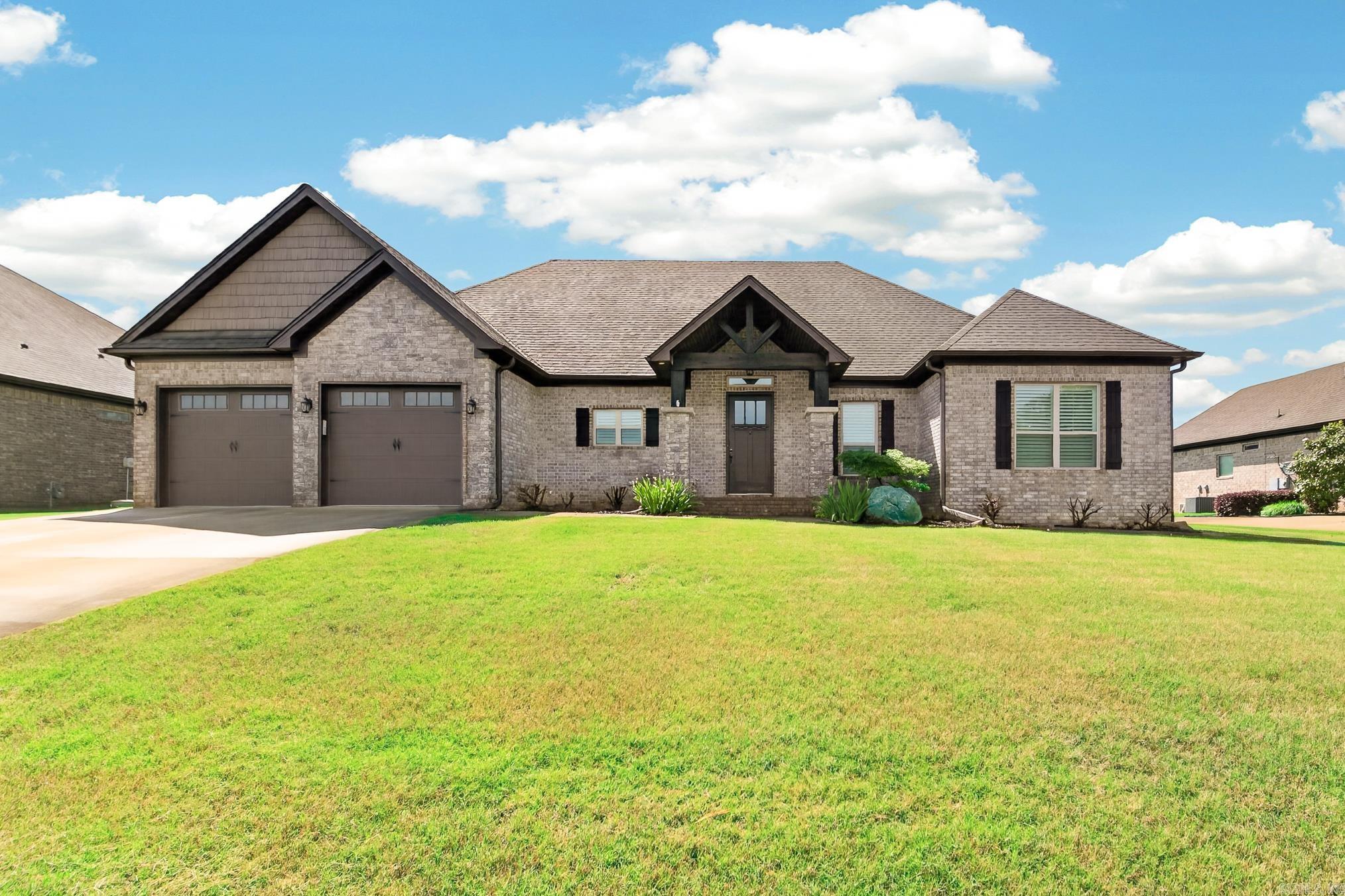 Welcome home to this beautifully designed 4 bedroom, 3.5 bath home with a dedicated office(counted as 4th bedroom) in the sought after Greystone subdivision. The inviting living area features a stunning wooden coffered ceiling and abundant natural light, creating a warm and welcoming space. The kitchen is well appointed with leathered granite countertops, ventahood, gas stovetop, wall oven, pantry, and a large island with breakfast bar, perfect for everyday living and entertaining. The spacious primary suite offers a relaxing retreat, while all bedrooms feature their own private bathroom, providing comfort and privacy for family or guests. A dedicated office adds flexibility for working from home or additional living space. Step outside to enjoy the covered back patio overlooking a large, fully fenced backyard with plenty of room to entertain or unwind. This home offers the perfect blend of style, function, and location. Schedule your showing today.
