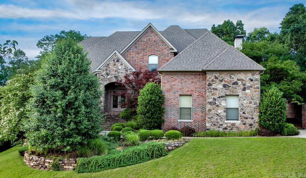 Custom built by Bill Parkinson as his own residence!  Spacious layout on private lot.  All rooms oversized.  Site finished hardwoods welcome you into formal dining rm and sep living room.  Kitchen with stainless, granite, and walk-in pantry.  Overlooks inviting hearth rm with wood burning fp.  Huge master with separate office/sitting rm.  Custom closet w built ins.  Spa tub, shower and sep vanities.  4 large beds up with walk in closets and 2 baths.  Three car garage, under house storage.  Covered porch!