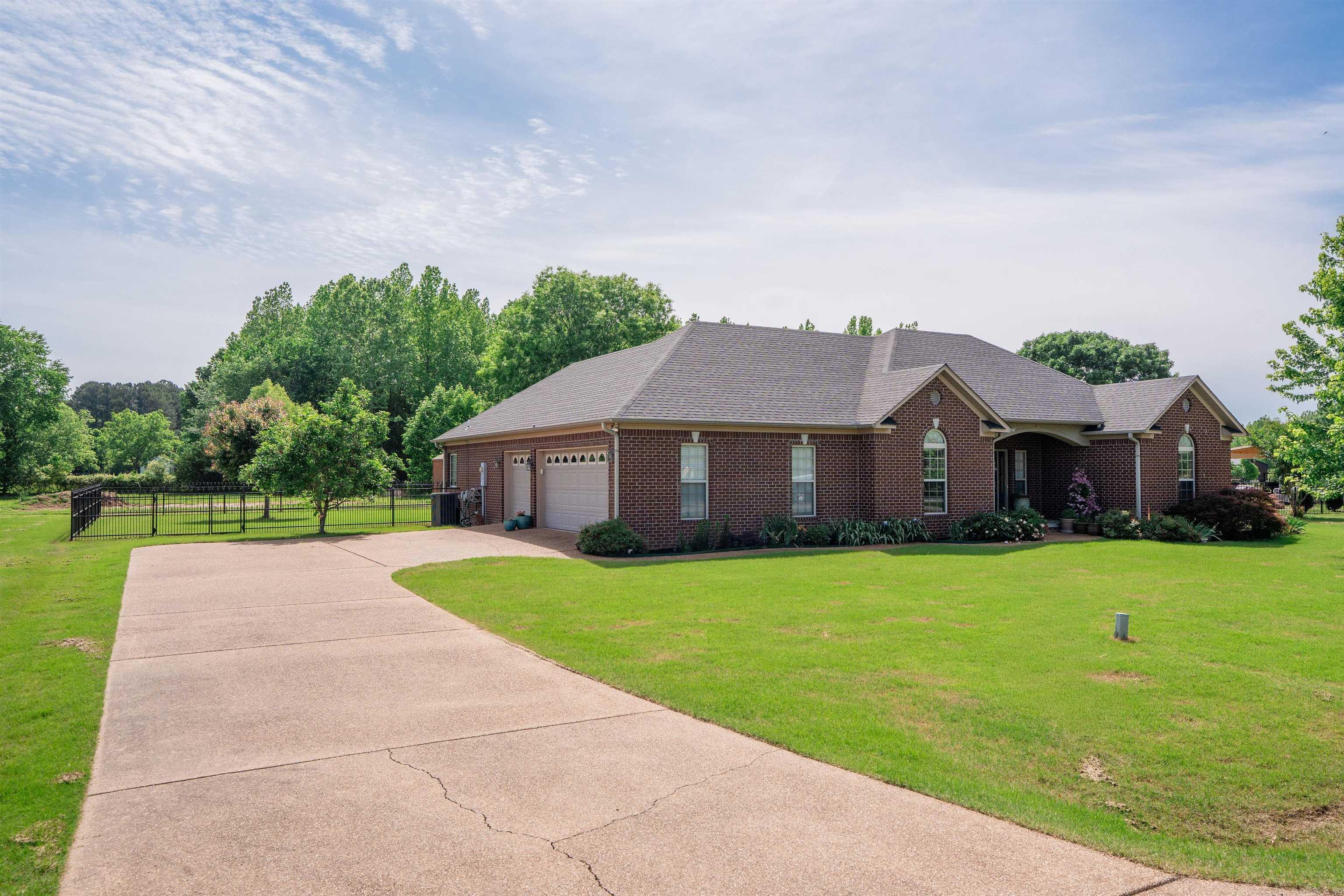 Beautiful 3-bedroom, 2-bath quality brick home featuring numerous upgrades throughout! This well-maintained property offers stainless steel appliances, granite countertops, and a stylish mix of travertine tile and wood flooring. The spacious living area includes a cozy gas fireplace, perfect for relaxing or entertaining. The home also features a finished 2-car garage complete with a built-in storm shelter for added safety and peace of mind. Step outside to enjoy a huge fenced backyard with elegant wrought iron fencing, providing both security and a high-end look. Major updates include a new HVAC system installed in 2018 and a new roof in 2021, making this home move-in ready. Don’t miss this opportunity to own a quality home with modern upgrades and lasting value!