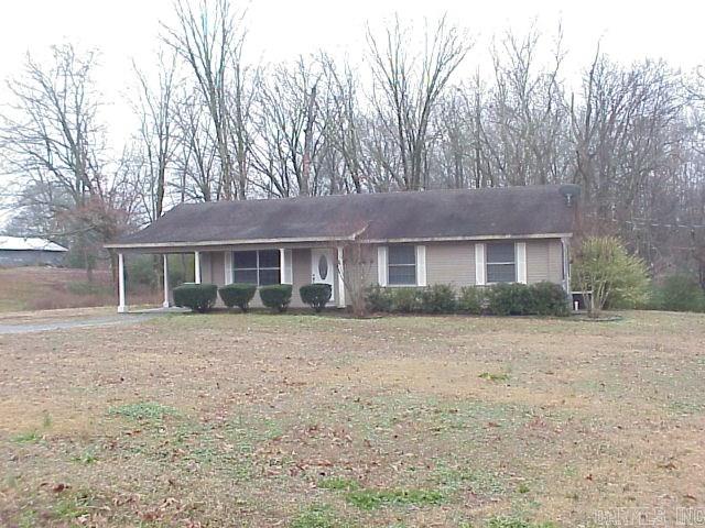 Great opportunity on 1.77 acre is 8 miles west of I-430 * Peace and quite in this low maintenance vinyl sided home w/ covered deck overlooking your tree-shaded acreage * Spacious rooms w/ Huge Kitchen/Dining combo and open-feel plan * Tons of storage/closets w/ separate 100 sq.ft. heated/cooled utility/storage room that is finished out * Plenty of space to build a great shop/store toys or possibly a 2nd home to keep this one as a rental or for a Mom.  Hurry ... hard to find at this price!  SEE Agent Remarks