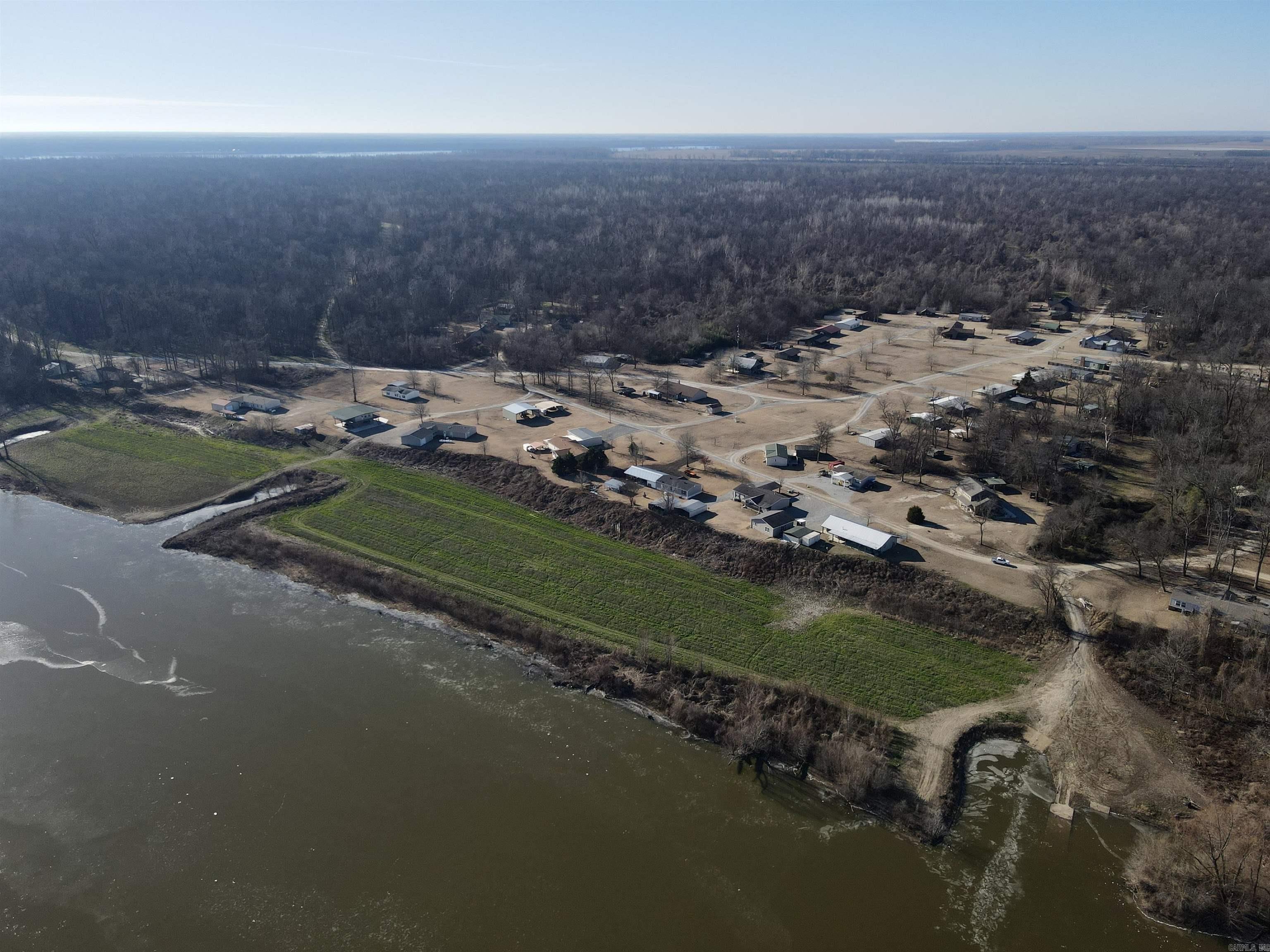 The Sportsman's Paradise you've been looking for on the banks of the mighty Mississippi River! The 8,500 acre m/l Jackson Point Hunting Club has a rich history spanning 40 years of outstanding Mississippi River bottom hunting. This is the perfect set up for your corporate retreat, an outstanding property for you and your hunting buddies, or a place to get away for a long weekend with your family.   5 equity memberships & 2 houses are being offered in the historic Jackson Point Hunting Club. (An additional membership and an additional house may be available too. Ask for details.)   Deer hunters, there aren’t many places you can harvest 5 trophy bucks on the same property.   Turkey hunters, there are few places left in Arkansas that have a thriving turkey population.  Duck hunters, Ham Lake, Mellwoood Lake, and Mississippi River overflow ground all add to the duck hunting!  Small game hunting opportunities appear to be endless.  For fishing, there’s nothing quite like crappie fishing in the Mississippi River oxbows.   For kids, there are miles upon miles of an improved trail system for atv and utv rides.   Amenities include a full-time caretaker, on-site internet, etc.
