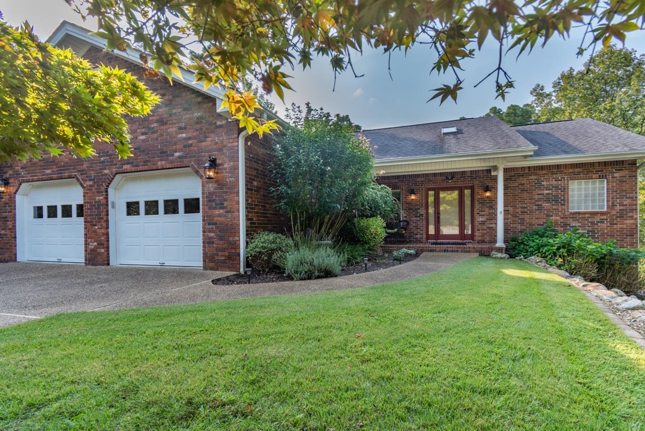 Entry level has 2300 SF, lower level has 1141 SF & 800 SF unfinished  on lower level. Lower level perfect for rental w/private entrance & patio, bed/bath & kitchenette & multi-purpose room. Garage on lower level, open on lake side. Entry level has open floor plan w/vaulted ceilings, updated kitchen, great rom w/fireplace, sunroom, breakfast room, formal dining room, Master bed/bath, guest room, 2nd guest room/bath. Master bed. separate. Wall of windows w/view of cove on Balboa Lake. AGENTS SEE REMARKS