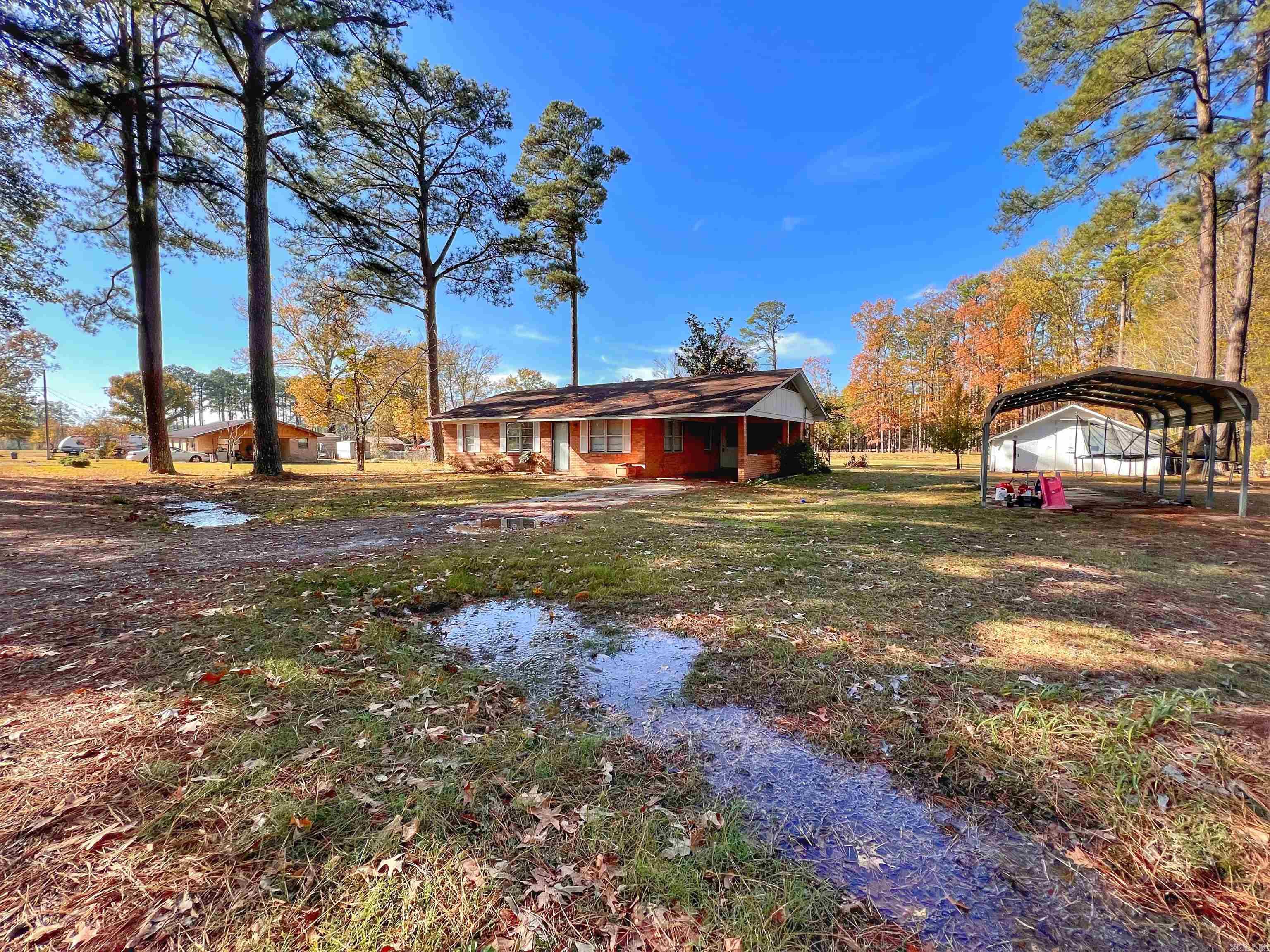 Have you been struggling to find a 3 bedroom budget friendly home that you can move into? The struggle is over! With updates made in this home all you need to do is go appliance shopping and move in. Covered parking walking into your laundry/mud room are perfect for keeping those shoes and dirt where they belong, out of sight! With vinyl flooring cleaning will be a breeze. The bathroom is spacious enough to share. Don’t miss the covered porch outside! This home is a great chance to make your home dreams a reality in budget.