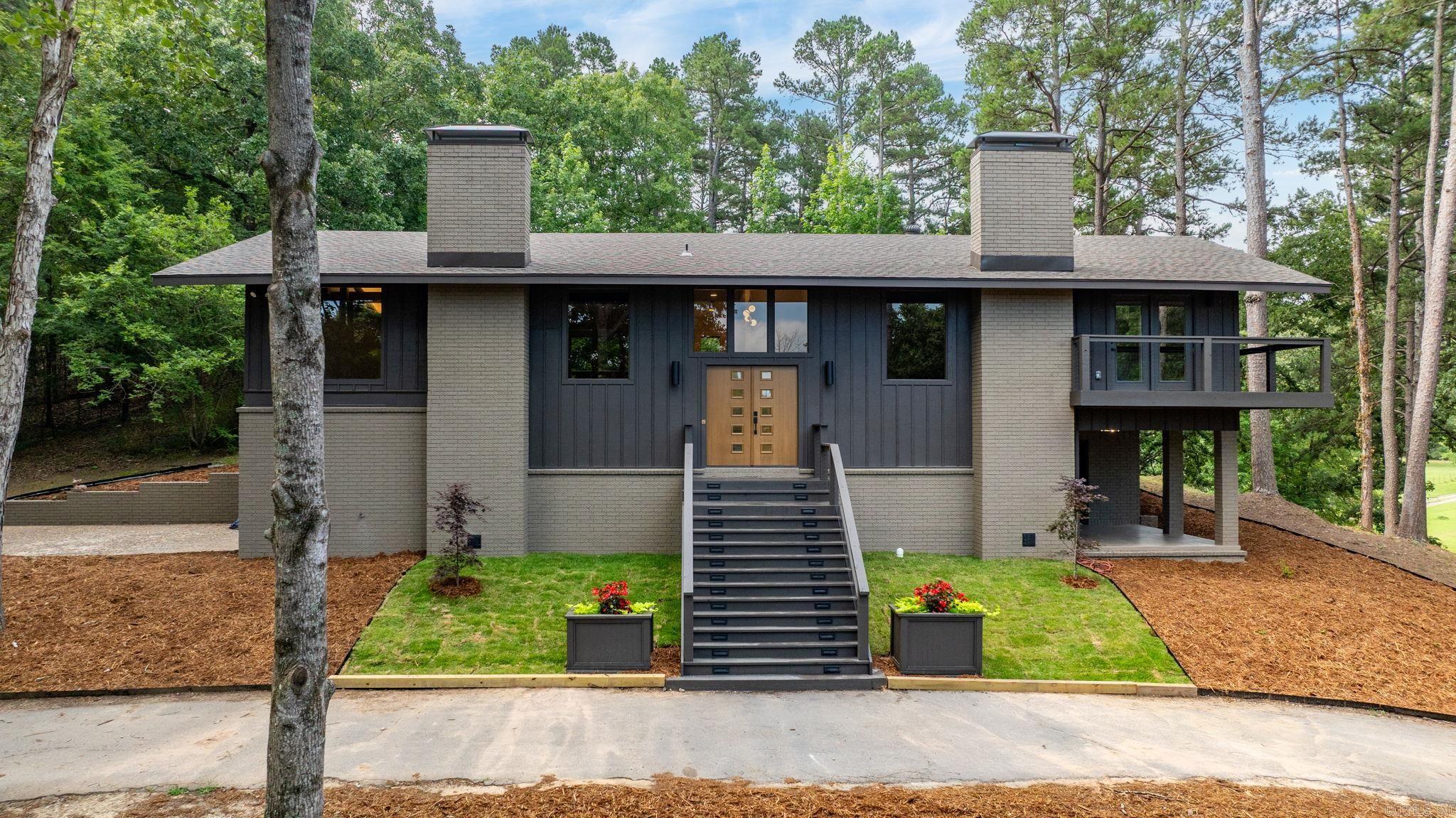 Situated on 8.48 scenic acres, this fully renovated 3-bedroom, 2-bath home offers privacy, space, and beautiful views. The main level includes a spacious primary suite with a fireplace and private balcony overlooking the property. The large living and dining areas feature wood flooring, vaulted ceilings, a fireplace, and a bar area, all flowing into the newly renovated kitchen. Downstairs, you’ll find two additional bedrooms with a Jack-and-Jill bath and access to a spacious patio. The laundry room is conveniently located off the garage, and the home offers excellent storage throughout. Outside, the property is equally impressive, with a level backyard and expansive acreage at the front of the lot. The setting offers potential for an additional structures, pool or simply added privacy and room to enjoy. This is a rare opportunity to own a move-in-ready home with acreage, modern updates, and endless possibilities. No SPD; update details are attached.