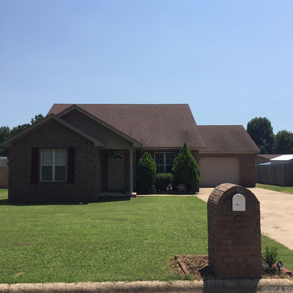Located in the Johnson Creek subdivision, this 3 Bedroom 2 bath brick home features an open floor kitchen dining combo, large living room, walk in closet in master bedroom, attached garage, and patio that would be great for entertaining guests.